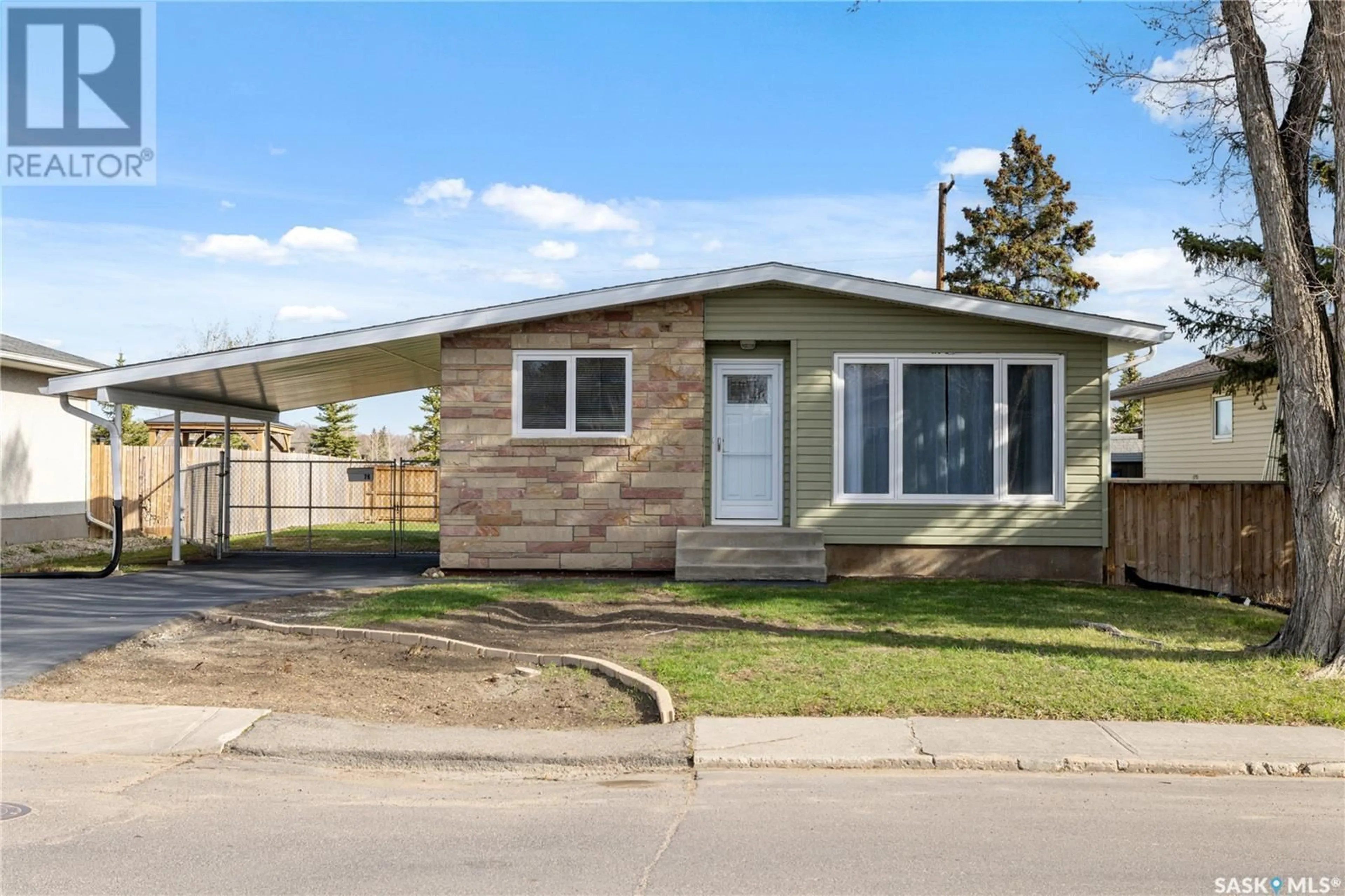 Home with vinyl exterior material, street for 76 MCCAUL CRESCENT, Regina Saskatchewan S4R3X1