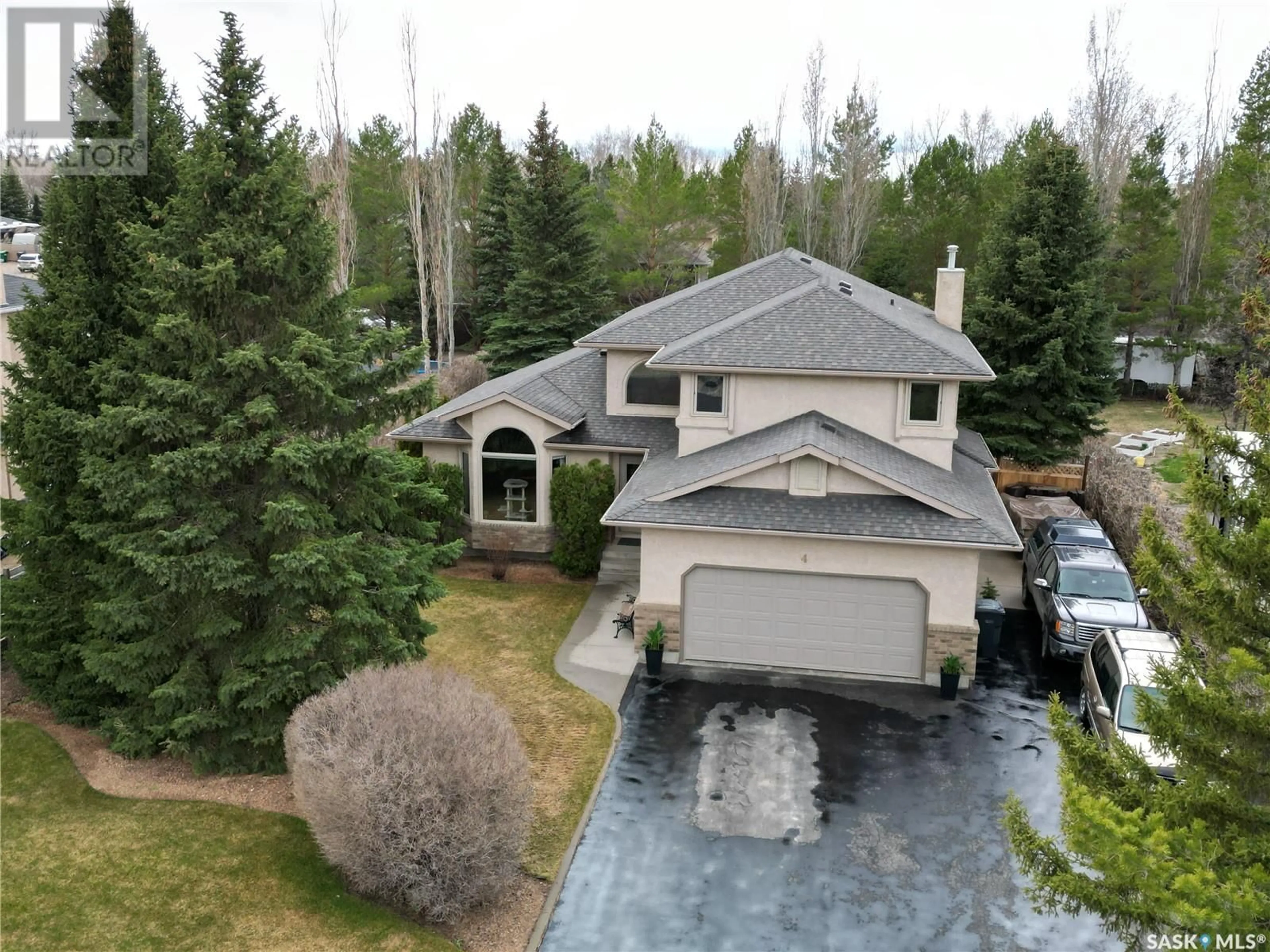 A pic from outside/outdoor area/front of a property/back of a property/a pic from drone, unknown for 4 PARK BAY, Emerald Park Saskatchewan S4L1B2
