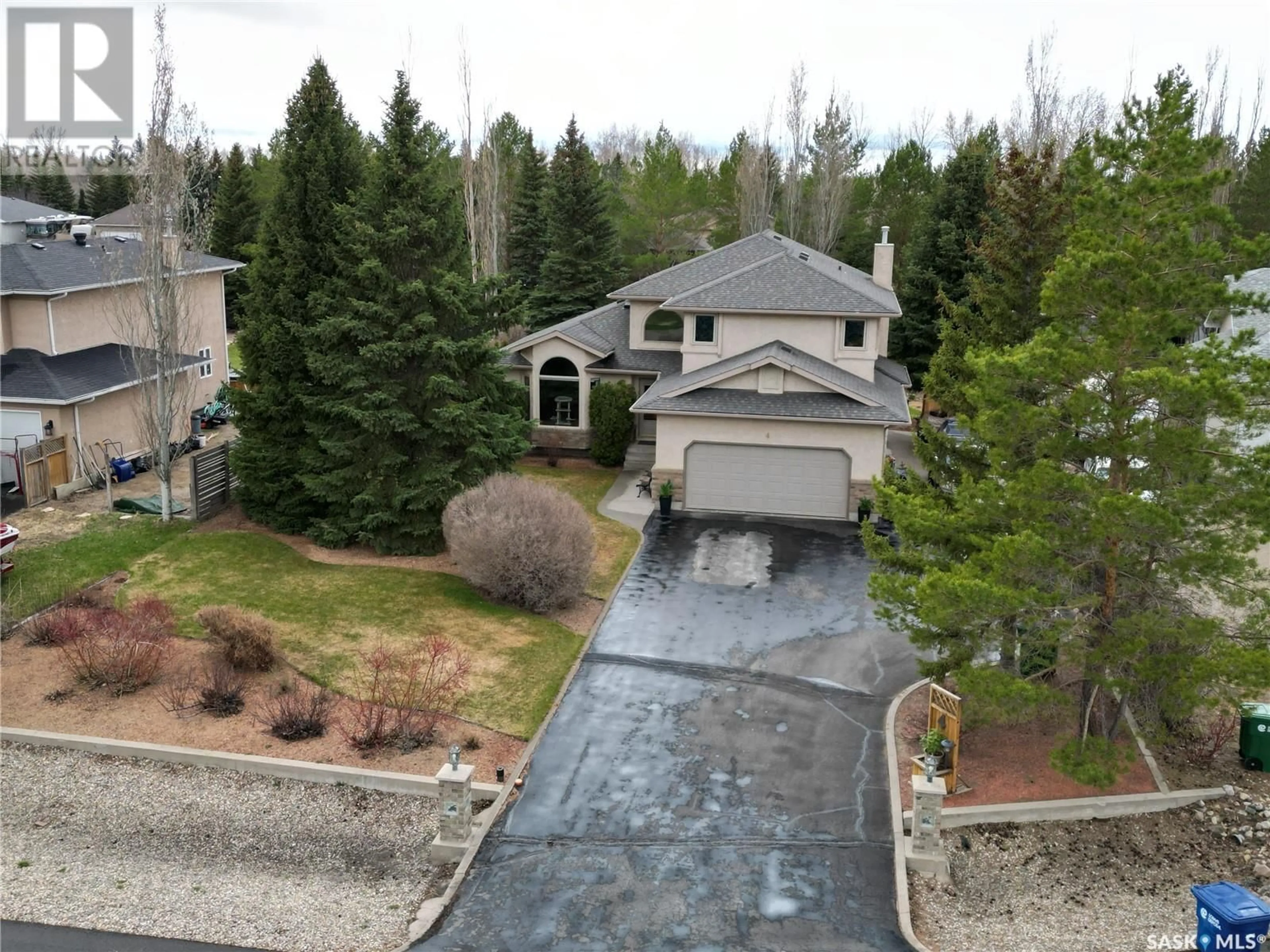 A pic from outside/outdoor area/front of a property/back of a property/a pic from drone, unknown for 4 PARK BAY, Emerald Park Saskatchewan S4L1B2