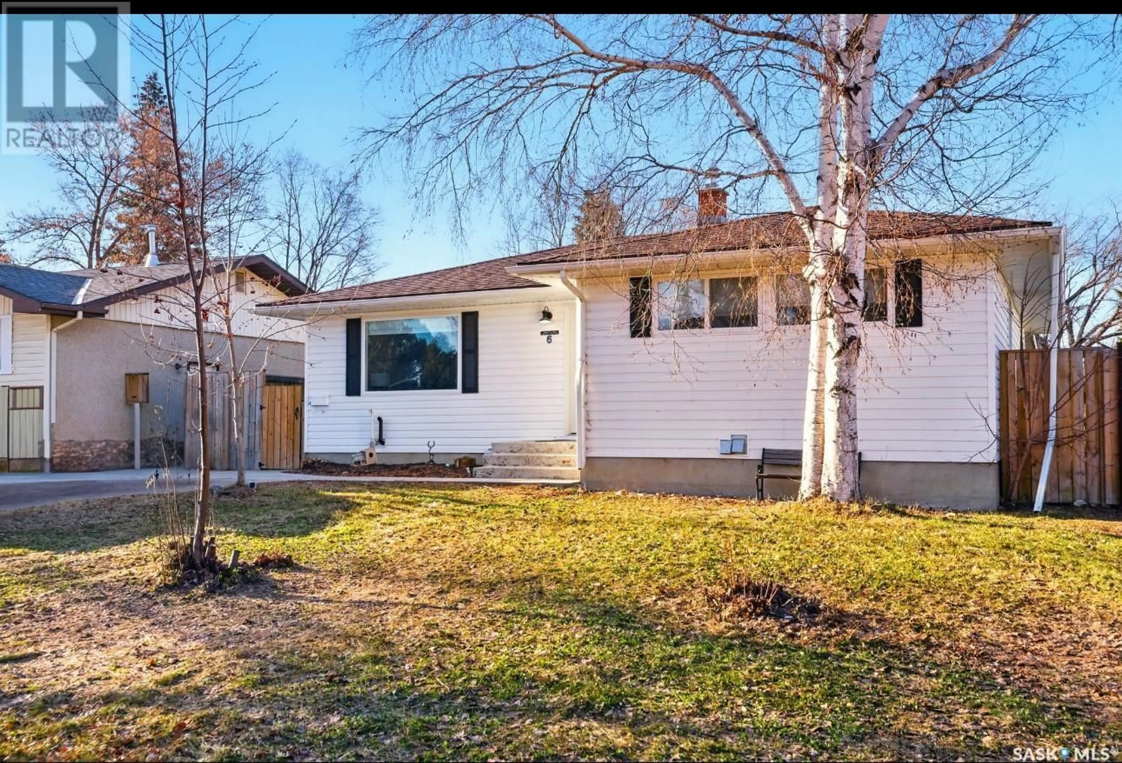 Home with vinyl exterior material, street for 6 VICKIES PLACE, Saskatoon Saskatchewan S7N2R2