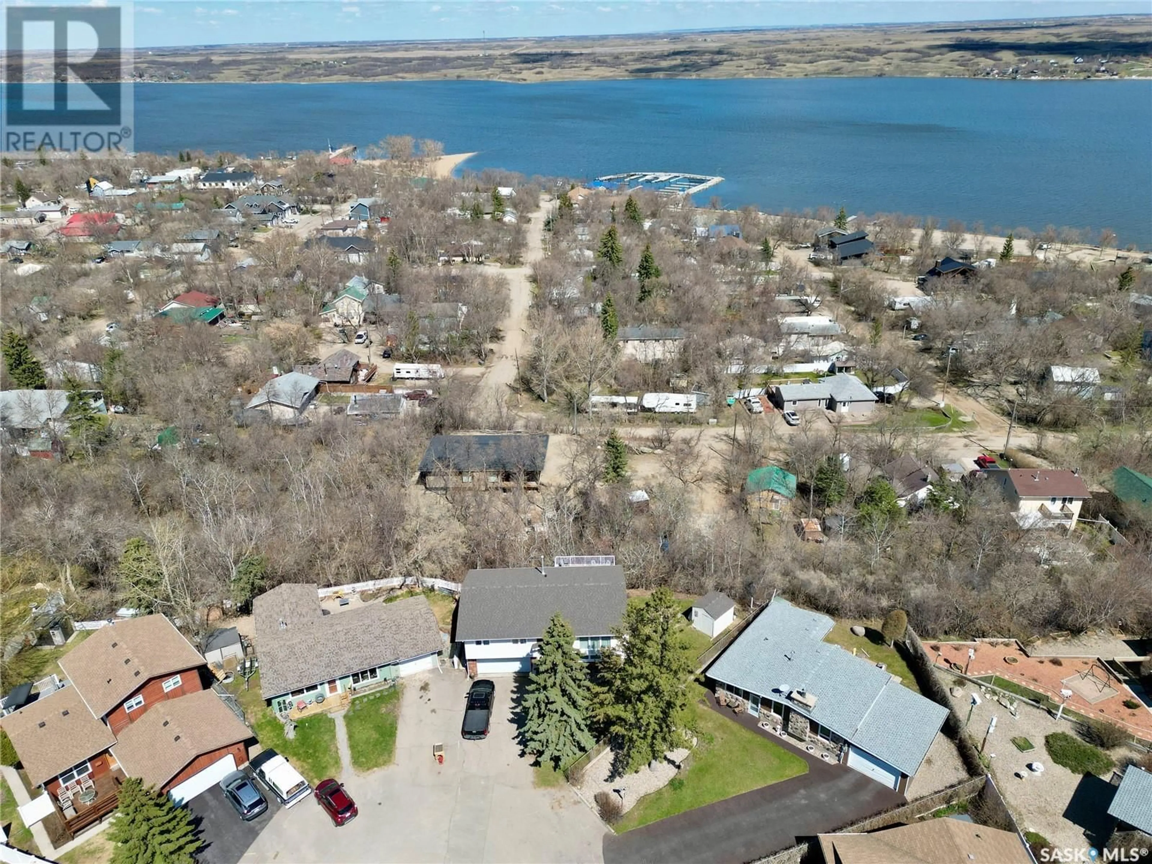 A pic from outside/outdoor area/front of a property/back of a property/a pic from drone, water/lake/river/ocean view for 106 BARBER PLACE, Regina Beach Saskatchewan S0G4C0