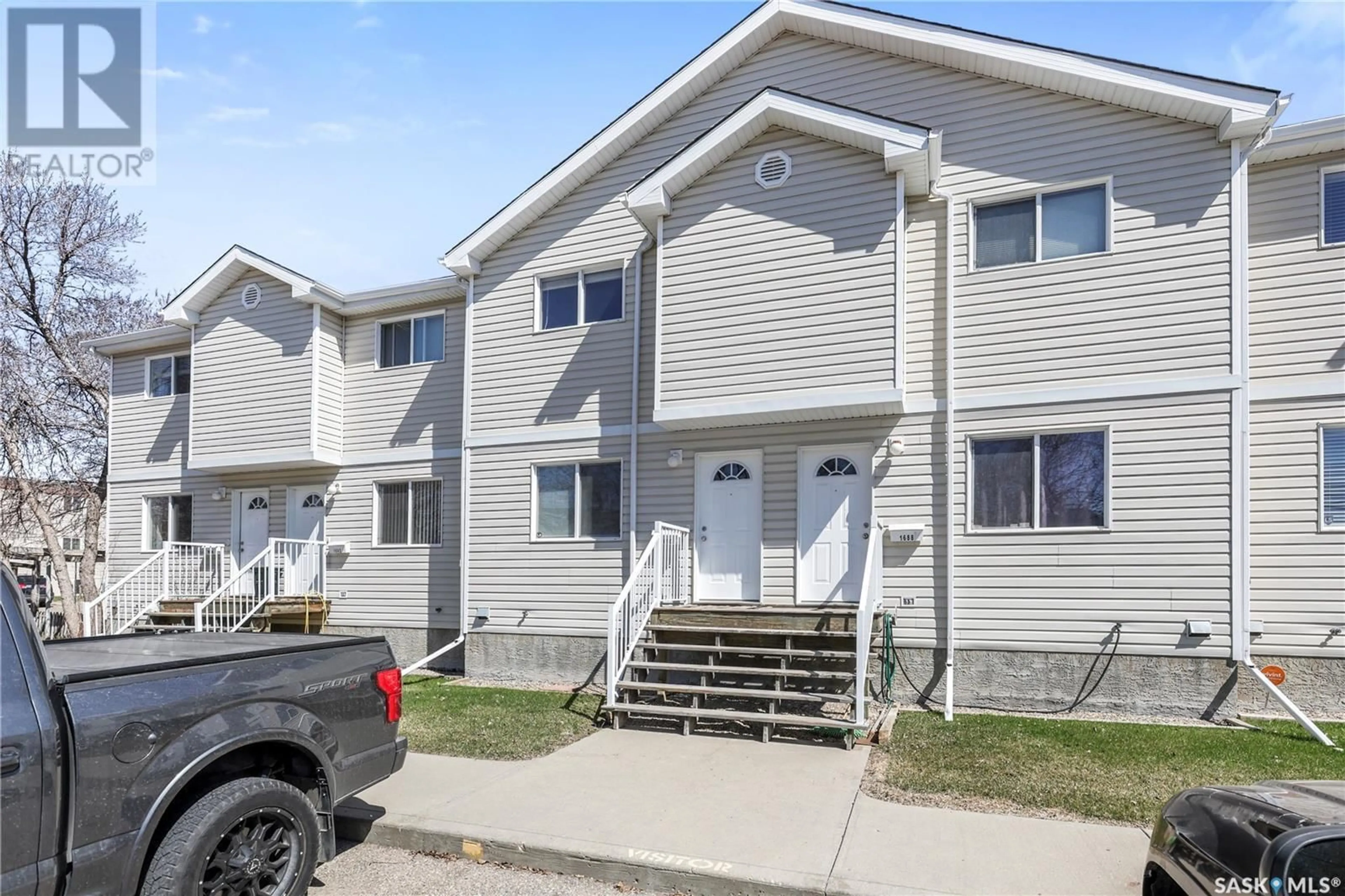Home with vinyl exterior material, street for 1690 ALEXANDRA STREET, Regina Saskatchewan S4T4P1