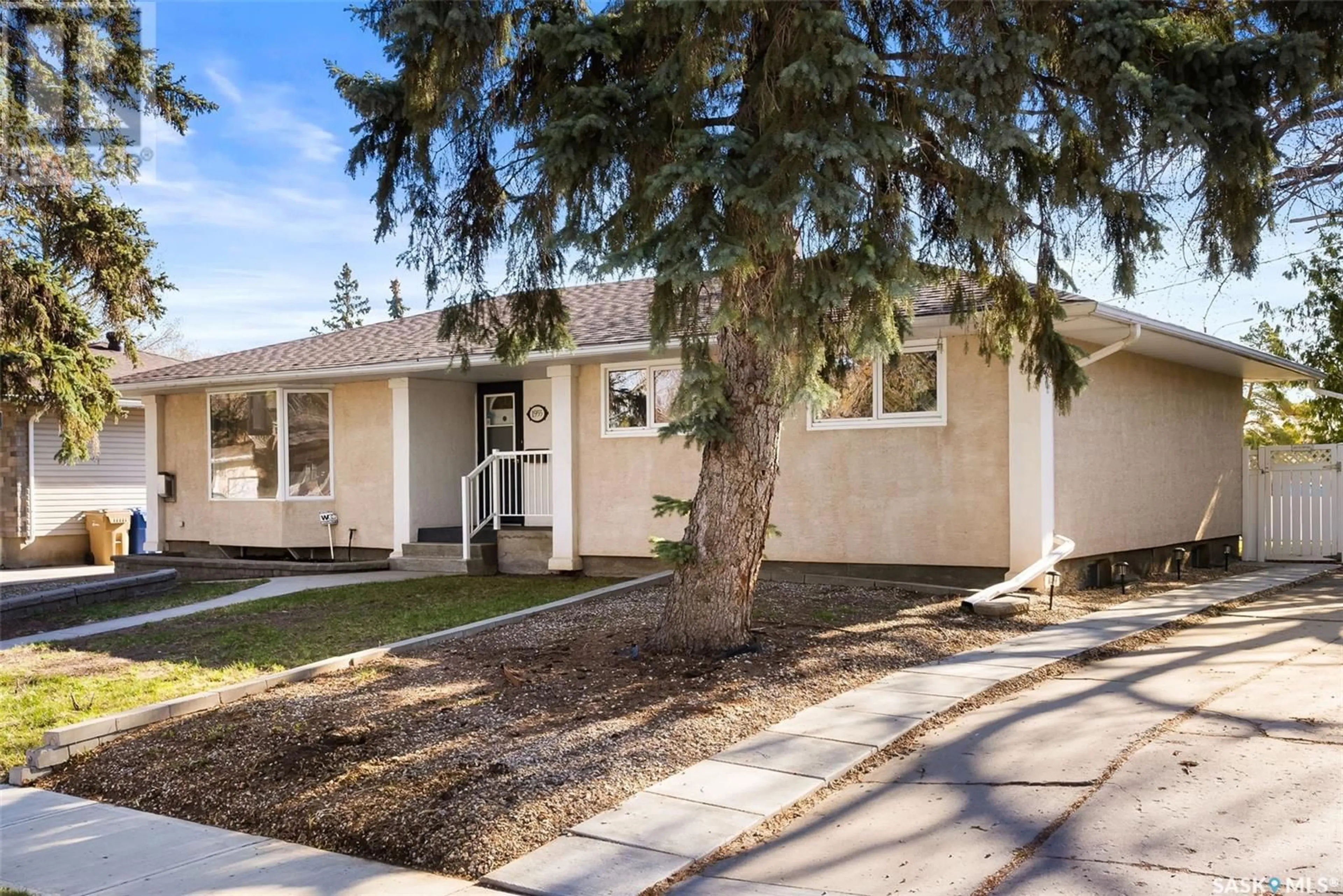 Home with vinyl exterior material, street for 1955 COWAN CRESCENT, Regina Saskatchewan S4S4C4