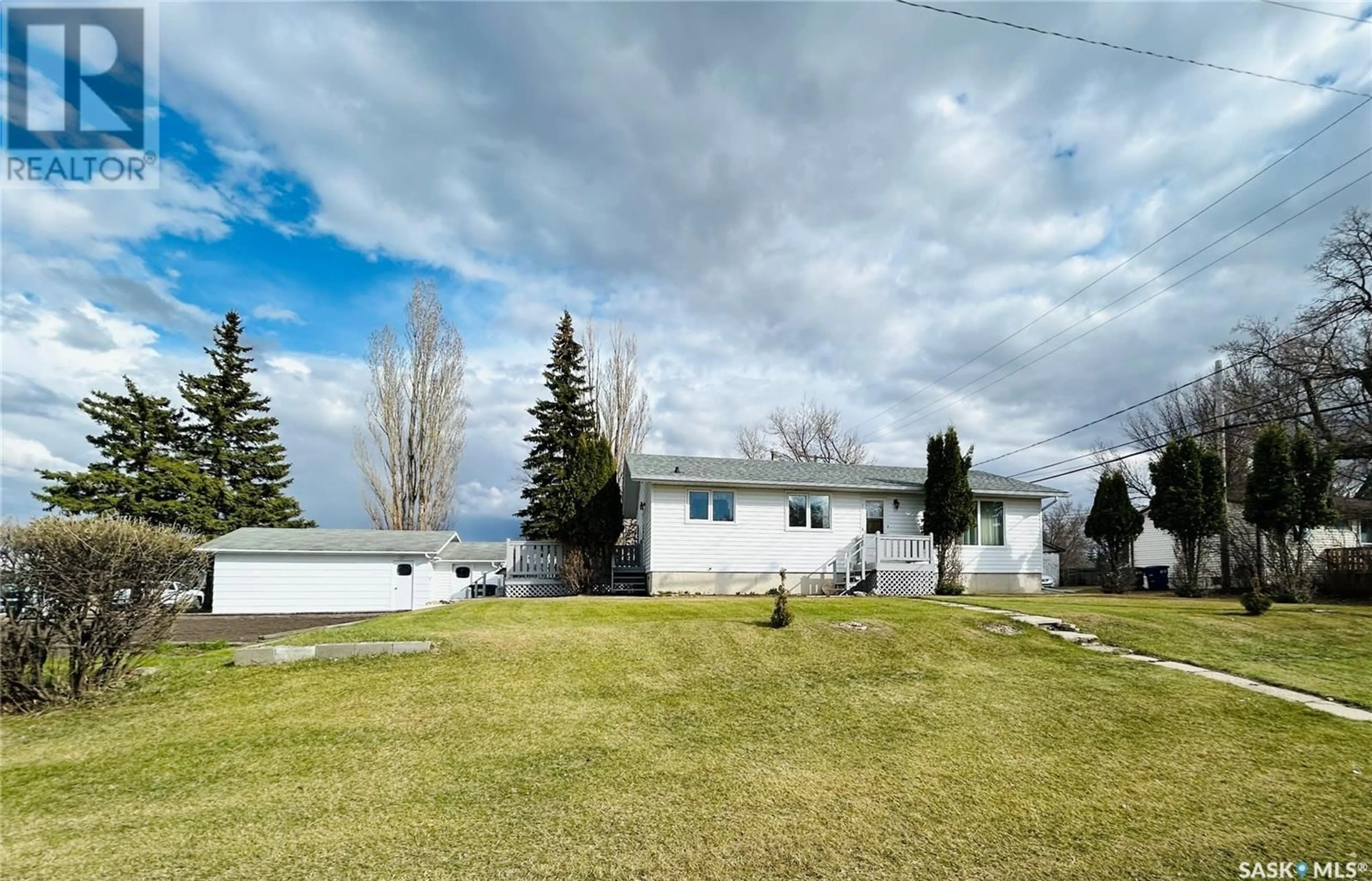 A pic from outside/outdoor area/front of a property/back of a property/a pic from drone, street for 1301 SOUTH FRONT STREET, Moosomin Saskatchewan S0G3N0