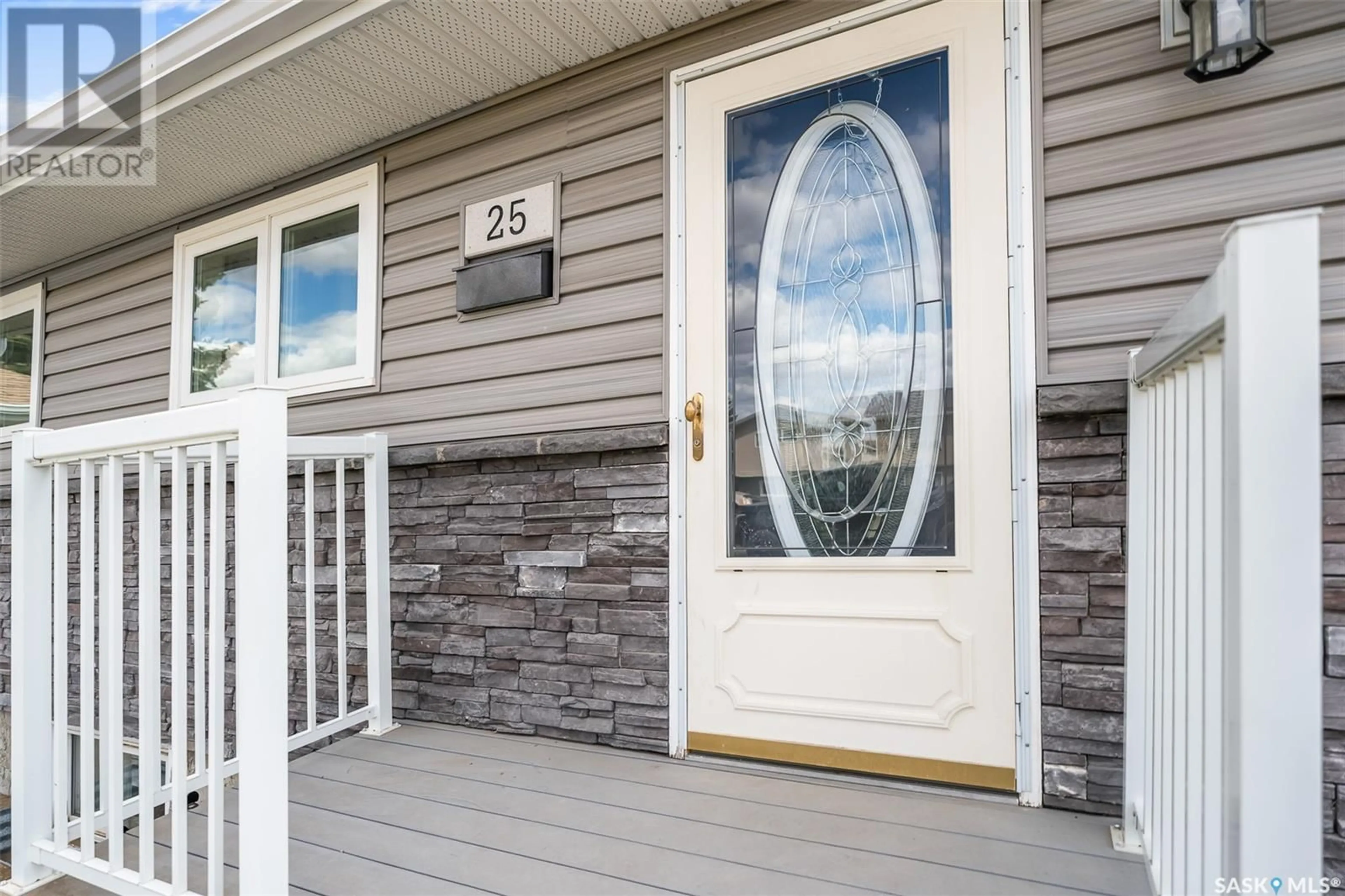 Home with vinyl exterior material, street for 25 WELLINGTON DRIVE, Moose Jaw Saskatchewan S6K1A2