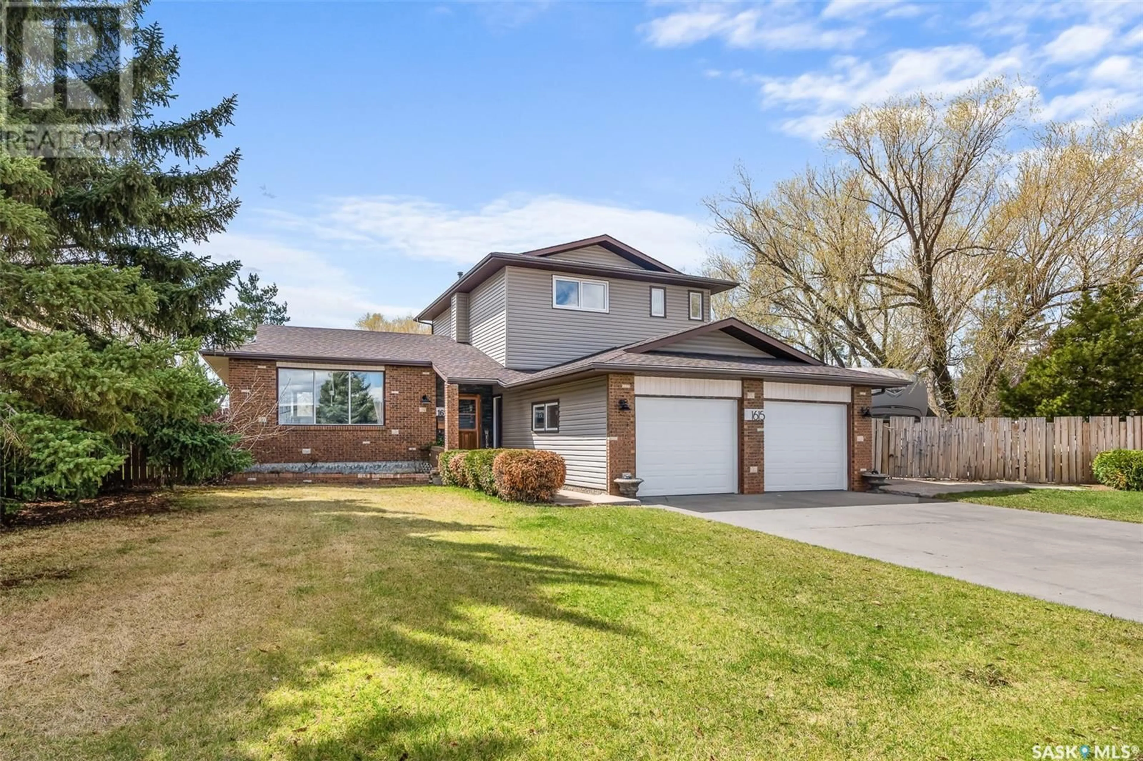 Home with brick exterior material, street for 1615 BOTTING BAY, Moose Jaw Saskatchewan S6H7S7