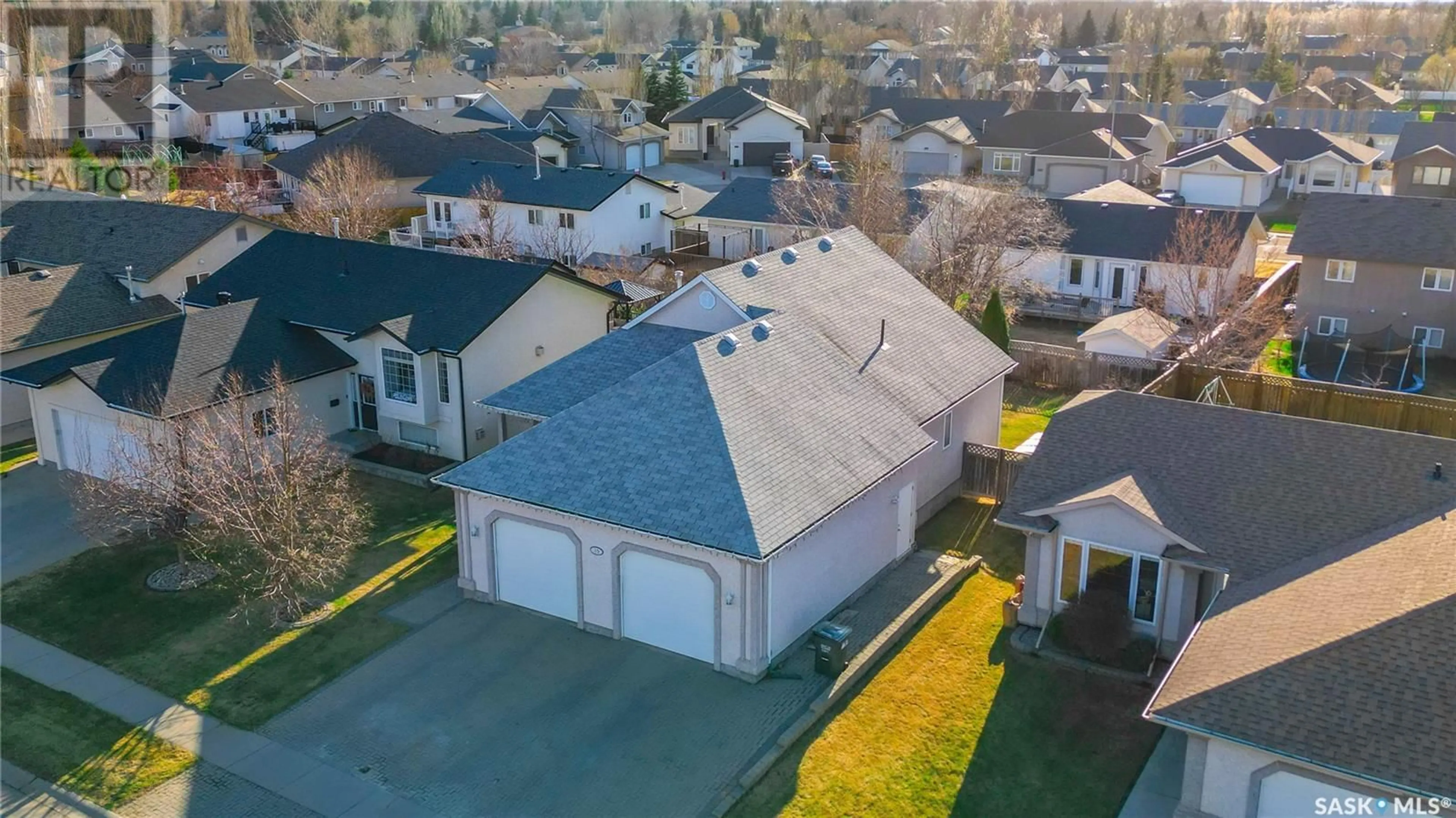 A pic from outside/outdoor area/front of a property/back of a property/a pic from drone, street for 15 LONGPRE CRESCENT, Prince Albert Saskatchewan S6X1C7