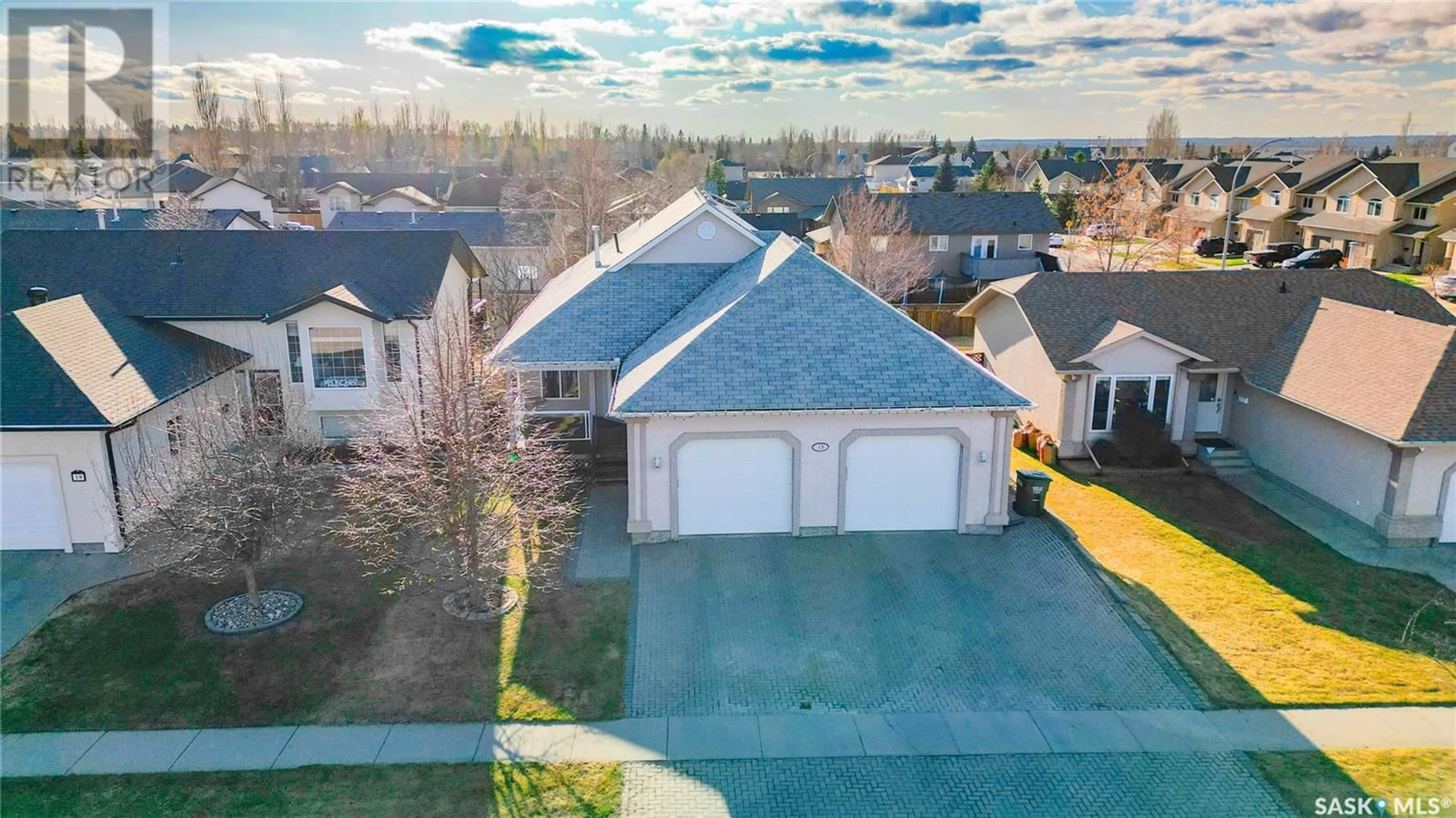 A pic from outside/outdoor area/front of a property/back of a property/a pic from drone, street for 15 LONGPRE CRESCENT, Prince Albert Saskatchewan S6X1C7