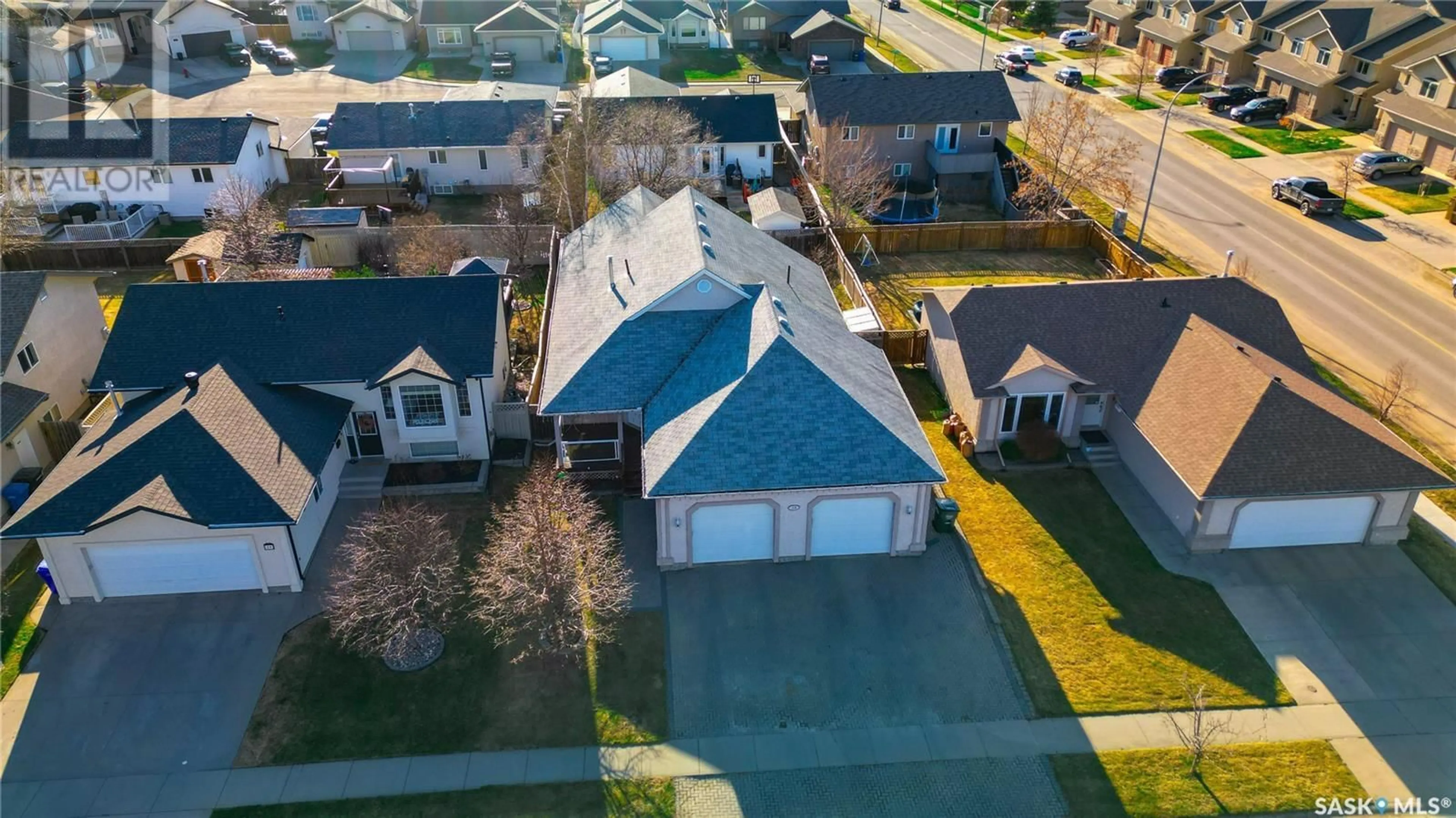 A pic from outside/outdoor area/front of a property/back of a property/a pic from drone, street for 15 LONGPRE CRESCENT, Prince Albert Saskatchewan S6X1C7