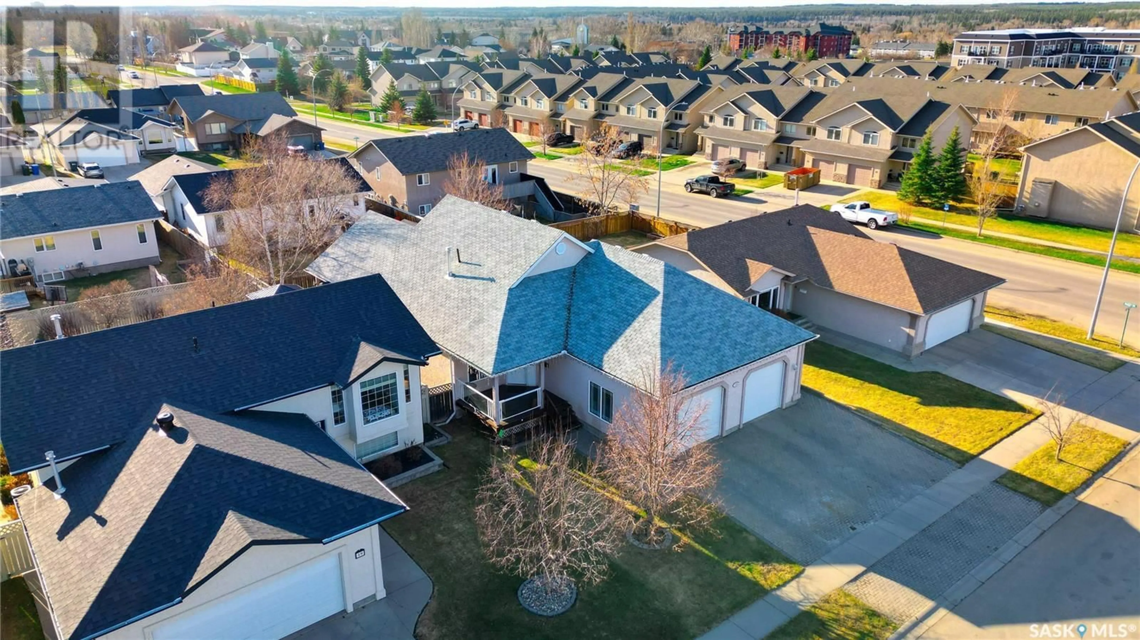 A pic from outside/outdoor area/front of a property/back of a property/a pic from drone, street for 15 LONGPRE CRESCENT, Prince Albert Saskatchewan S6X1C7