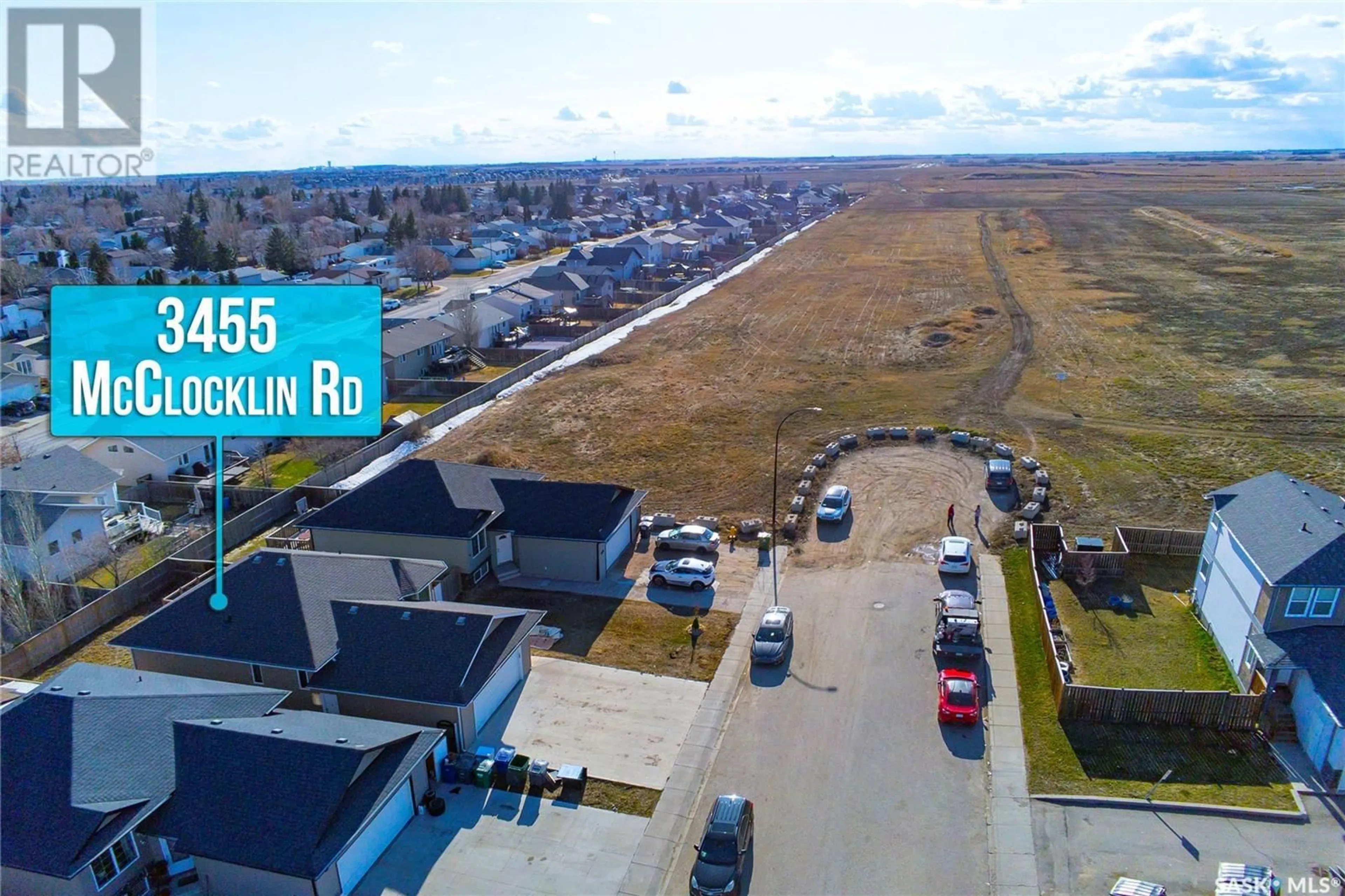 A pic from outside/outdoor area/front of a property/back of a property/a pic from drone, street for 3455 MCCLOCKLIN ROAD, Saskatoon Saskatchewan S7R0C2