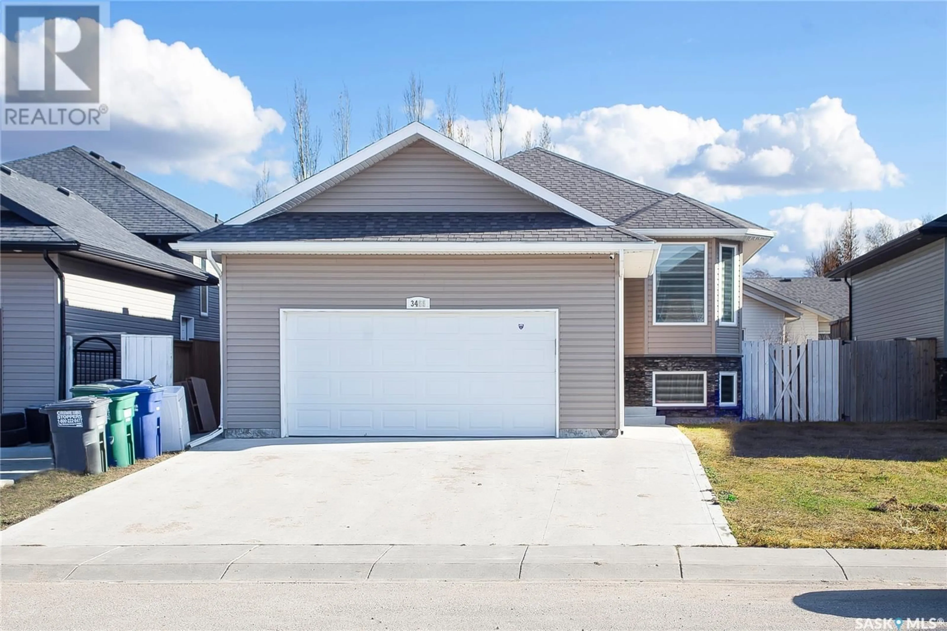 Home with vinyl exterior material, street for 3455 MCCLOCKLIN ROAD, Saskatoon Saskatchewan S7R0C2