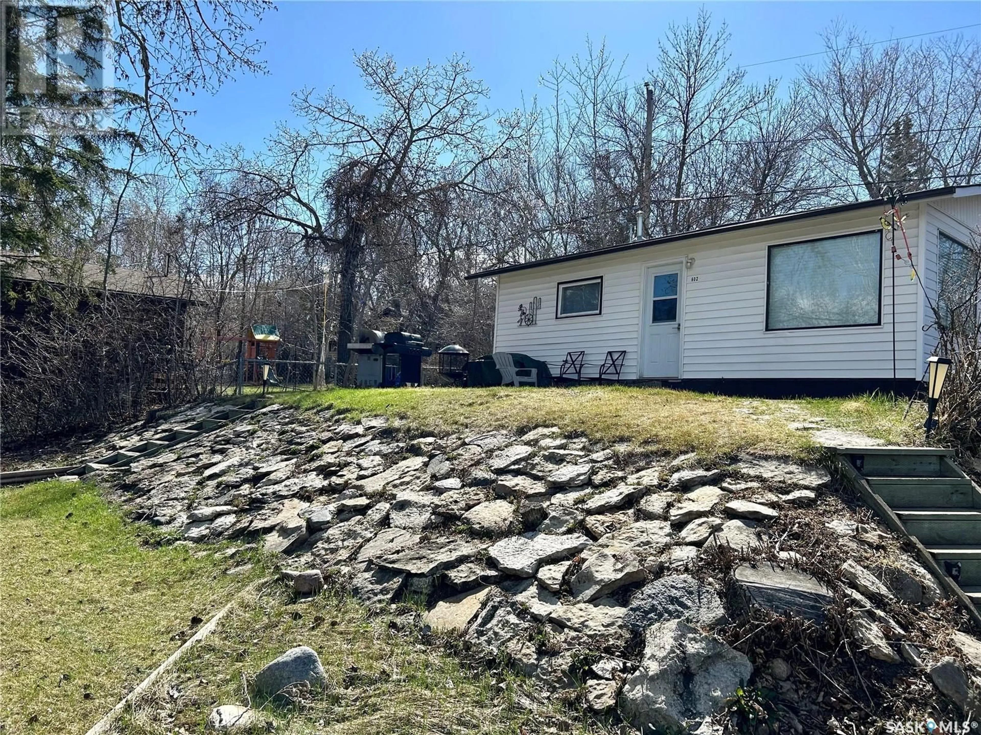 A pic from outside/outdoor area/front of a property/back of a property/a pic from drone, unknown for 602 16TH STREET, Regina Beach Saskatchewan S0G4C0