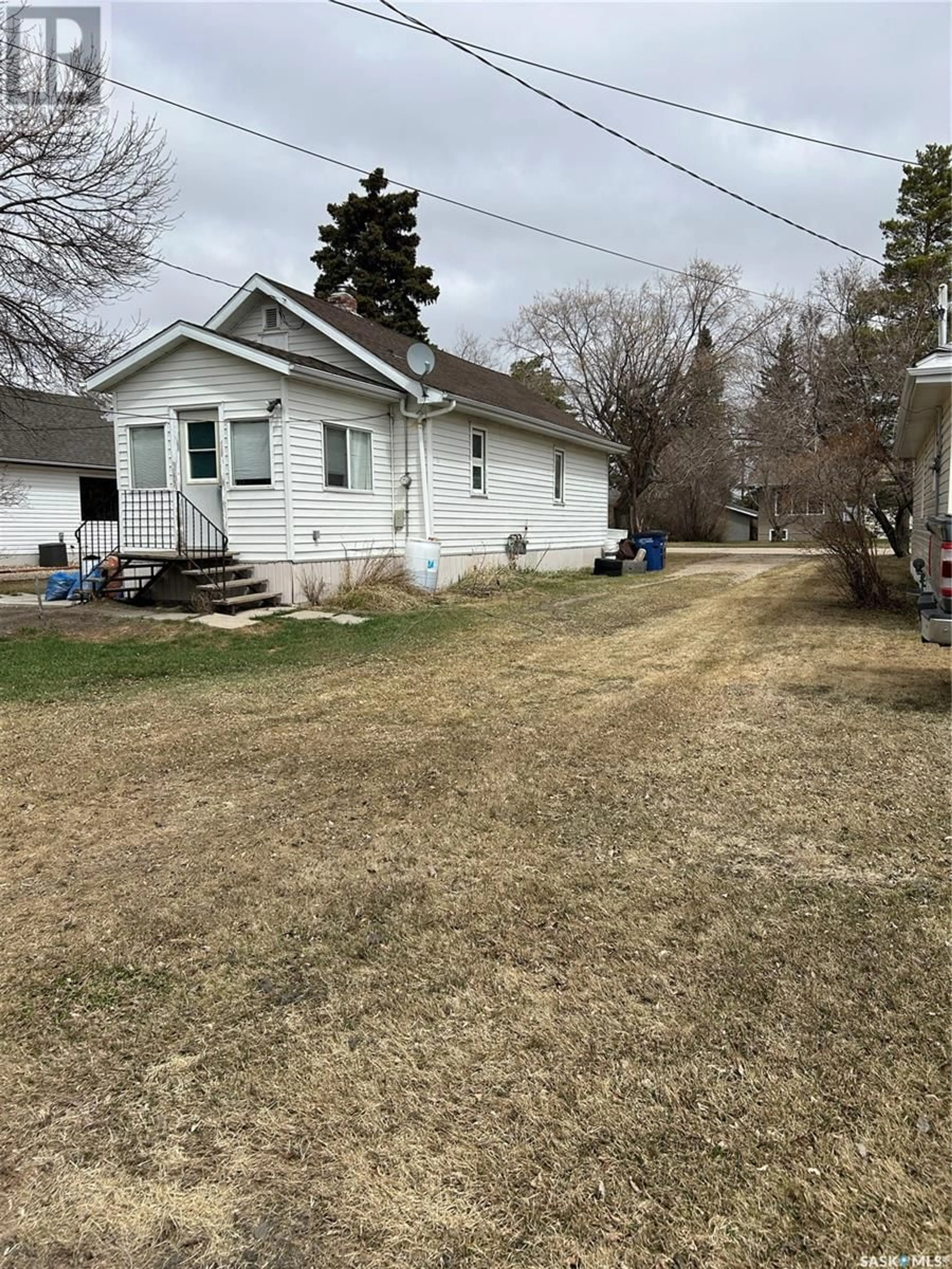 A pic from outside/outdoor area/front of a property/back of a property/a pic from drone, street for 103 3RD AVENUE, Kelvington Saskatchewan S0A1W0