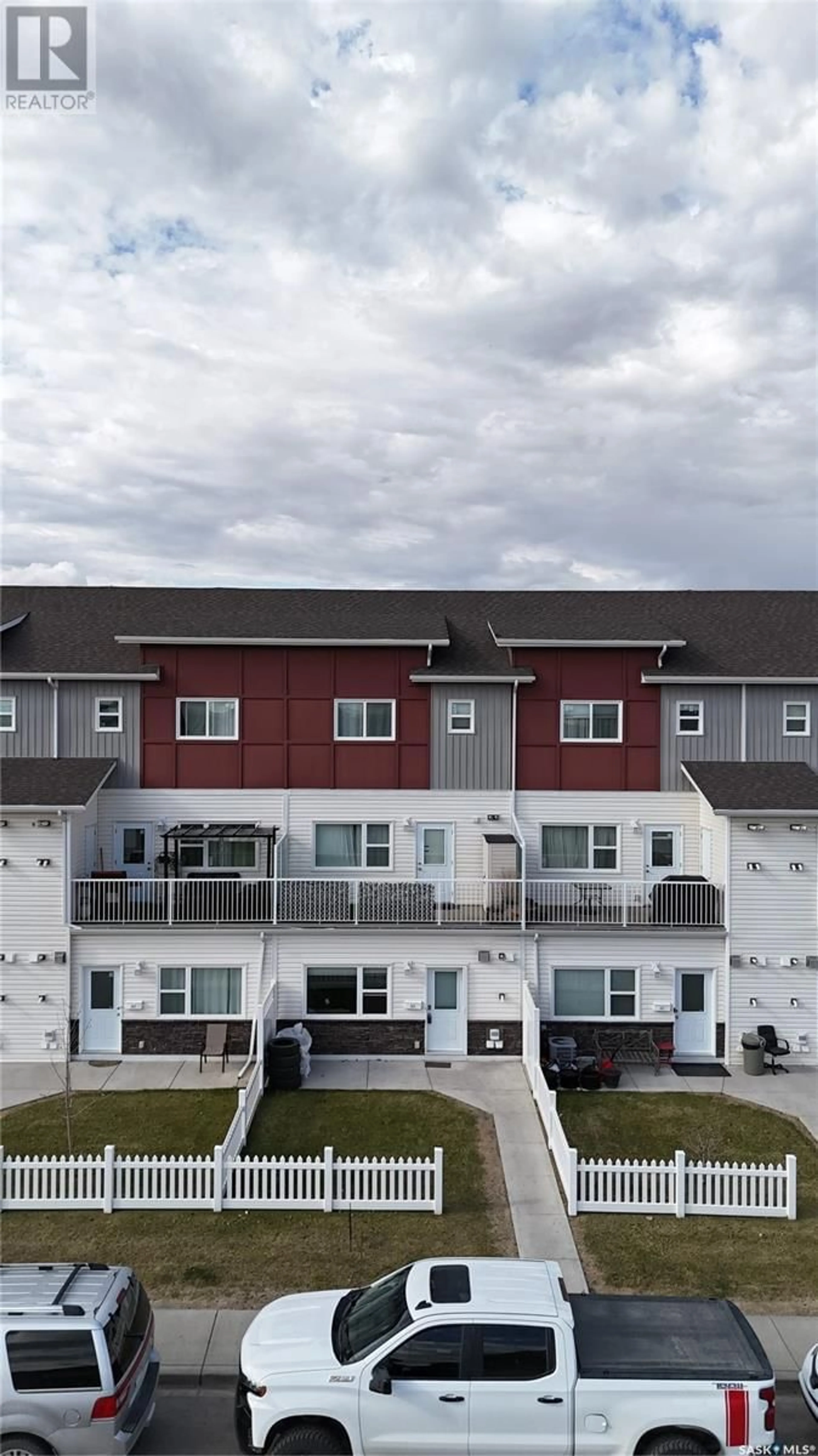 A pic from outside/outdoor area/front of a property/back of a property/a pic from drone, unknown for 265 322 LEWIN WAY, Saskatoon Saskatchewan S7T0A7