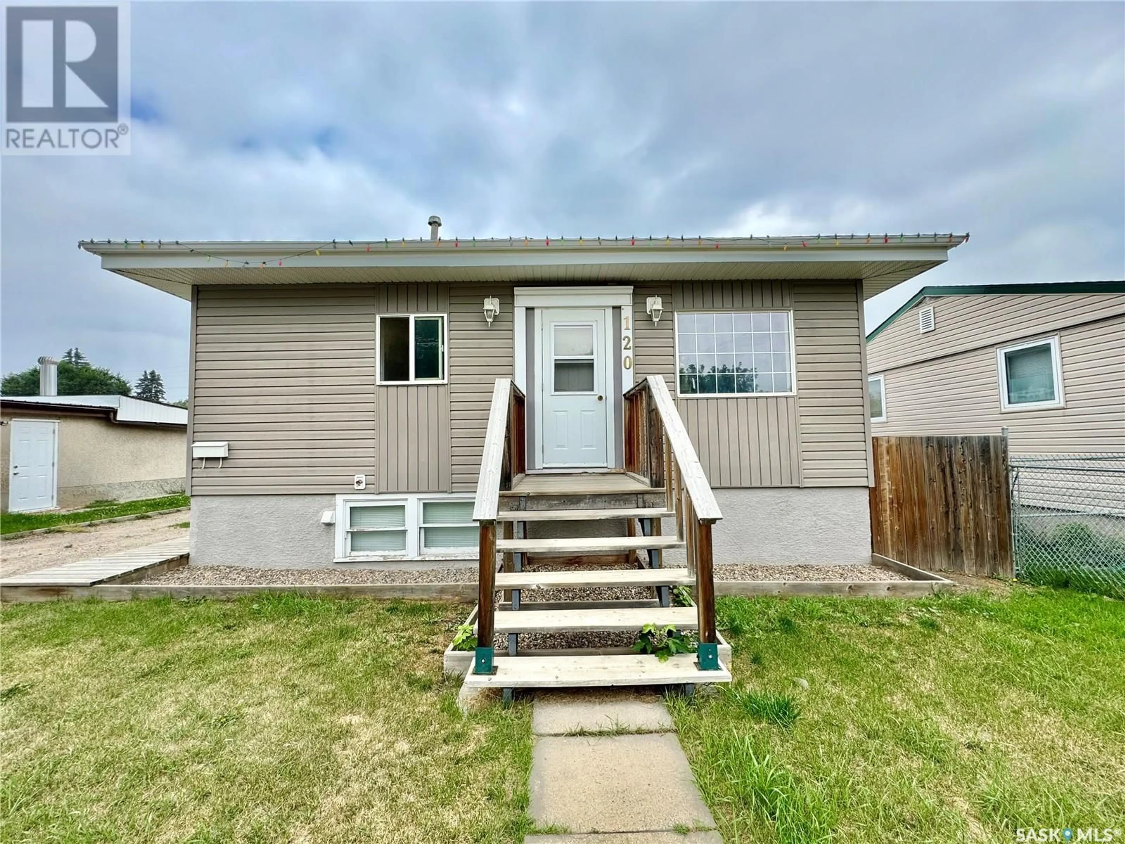 Home with vinyl exterior material, street for 120 28TH STREET, Prince Albert Saskatchewan S6V0S7