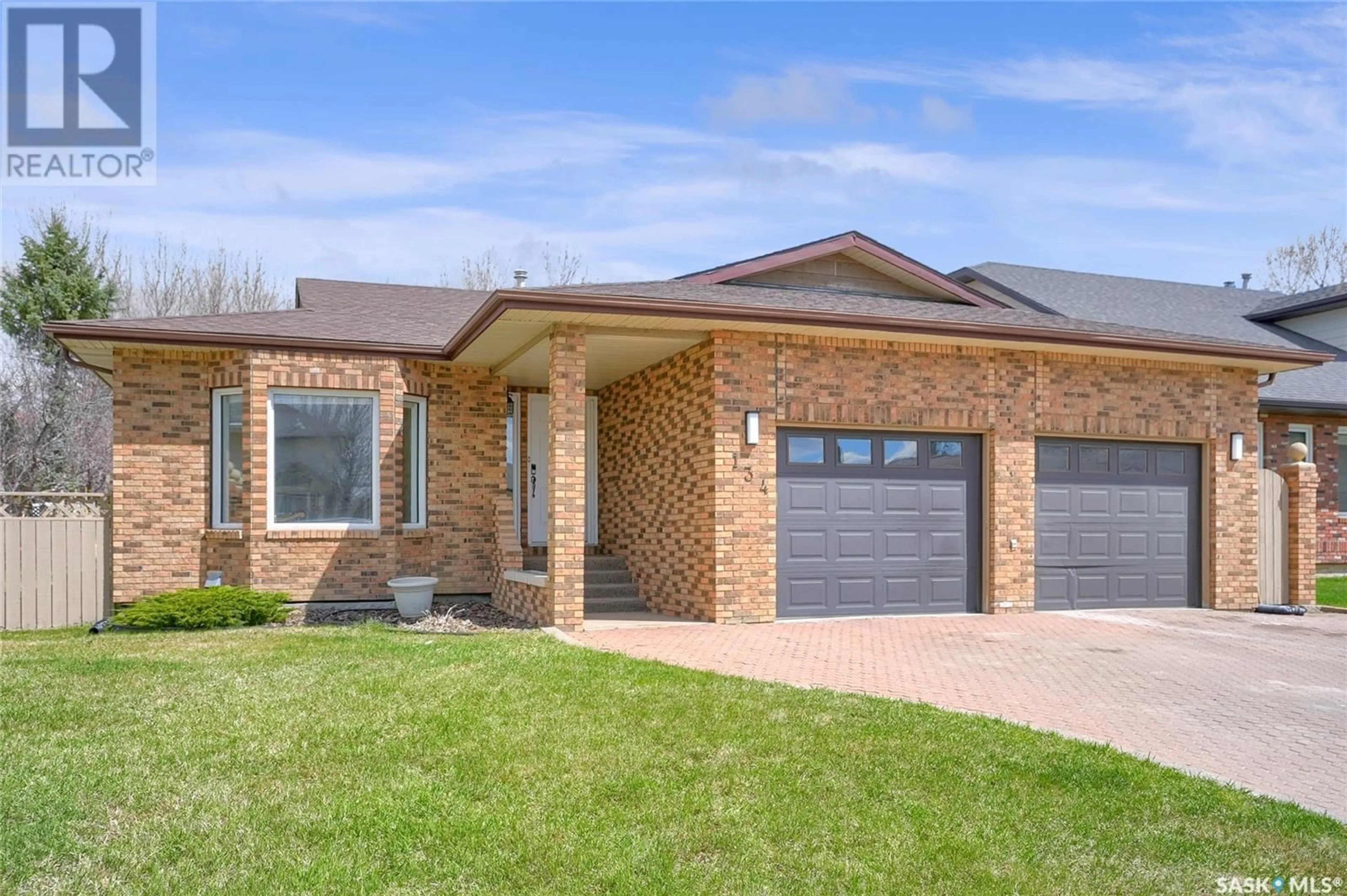 Home with brick exterior material, street for 134 CALYPSO DRIVE, Moose Jaw Saskatchewan S6J1G8