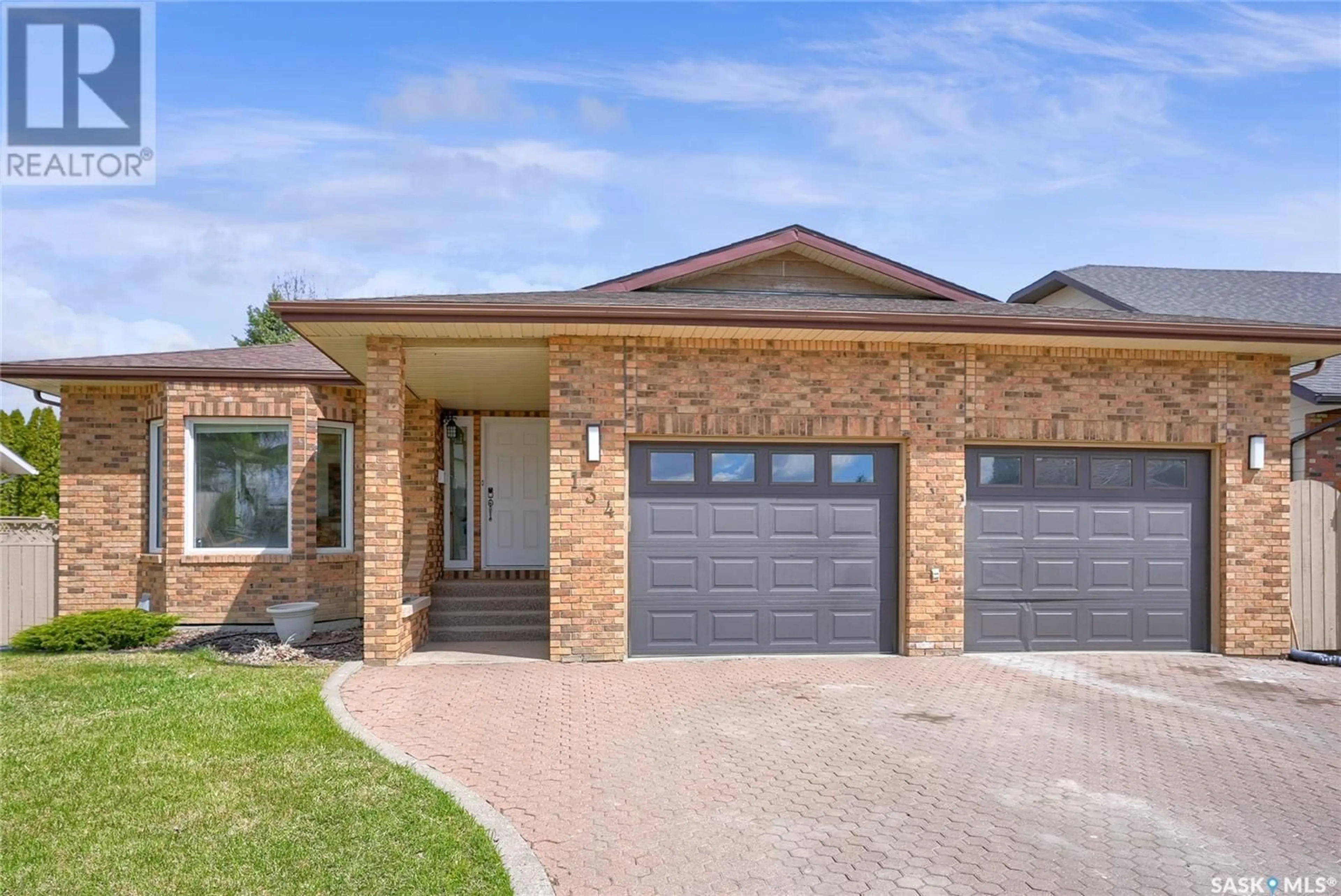 Home with brick exterior material, street for 134 CALYPSO DRIVE, Moose Jaw Saskatchewan S6J1G8