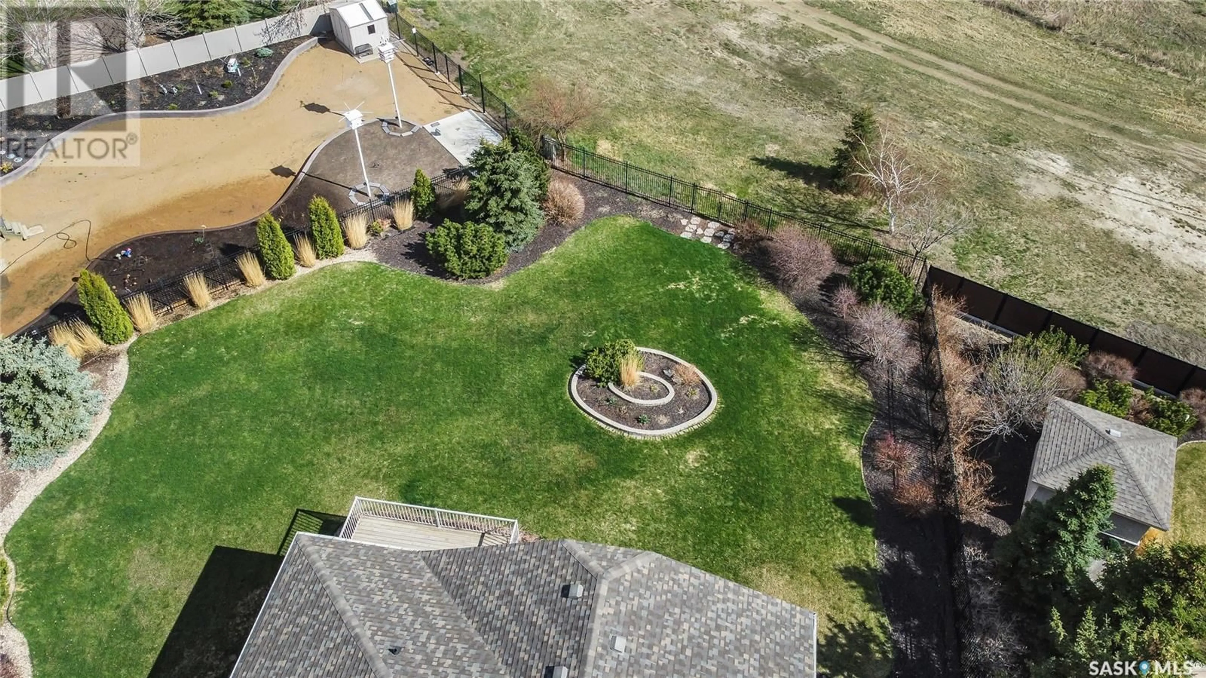 A pic from outside/outdoor area/front of a property/back of a property/a pic from drone, mountain view for 1429 NORMANDY DRIVE, Moose Jaw Saskatchewan S6H6P1