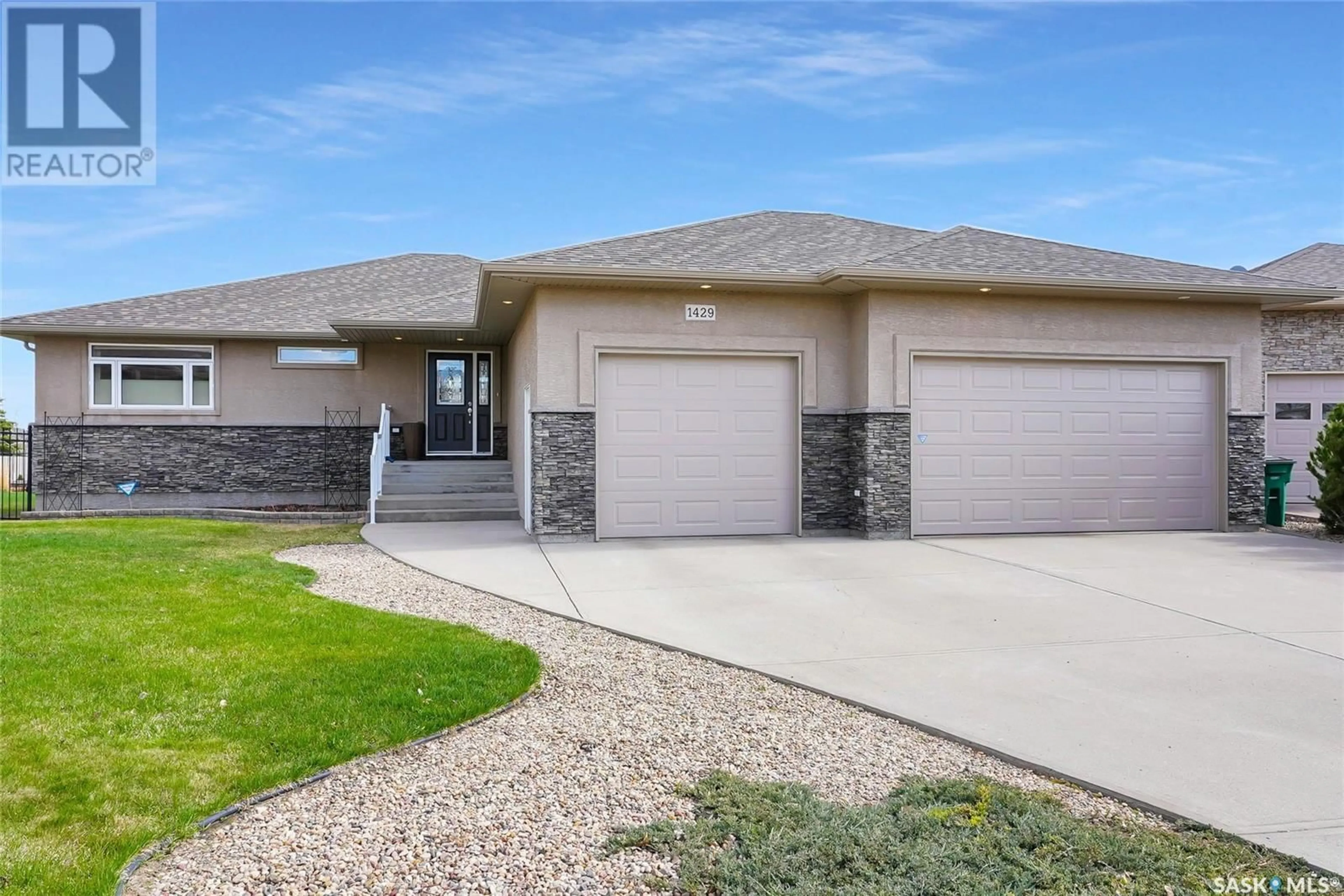 Home with brick exterior material, street for 1429 NORMANDY DRIVE, Moose Jaw Saskatchewan S6H6P1