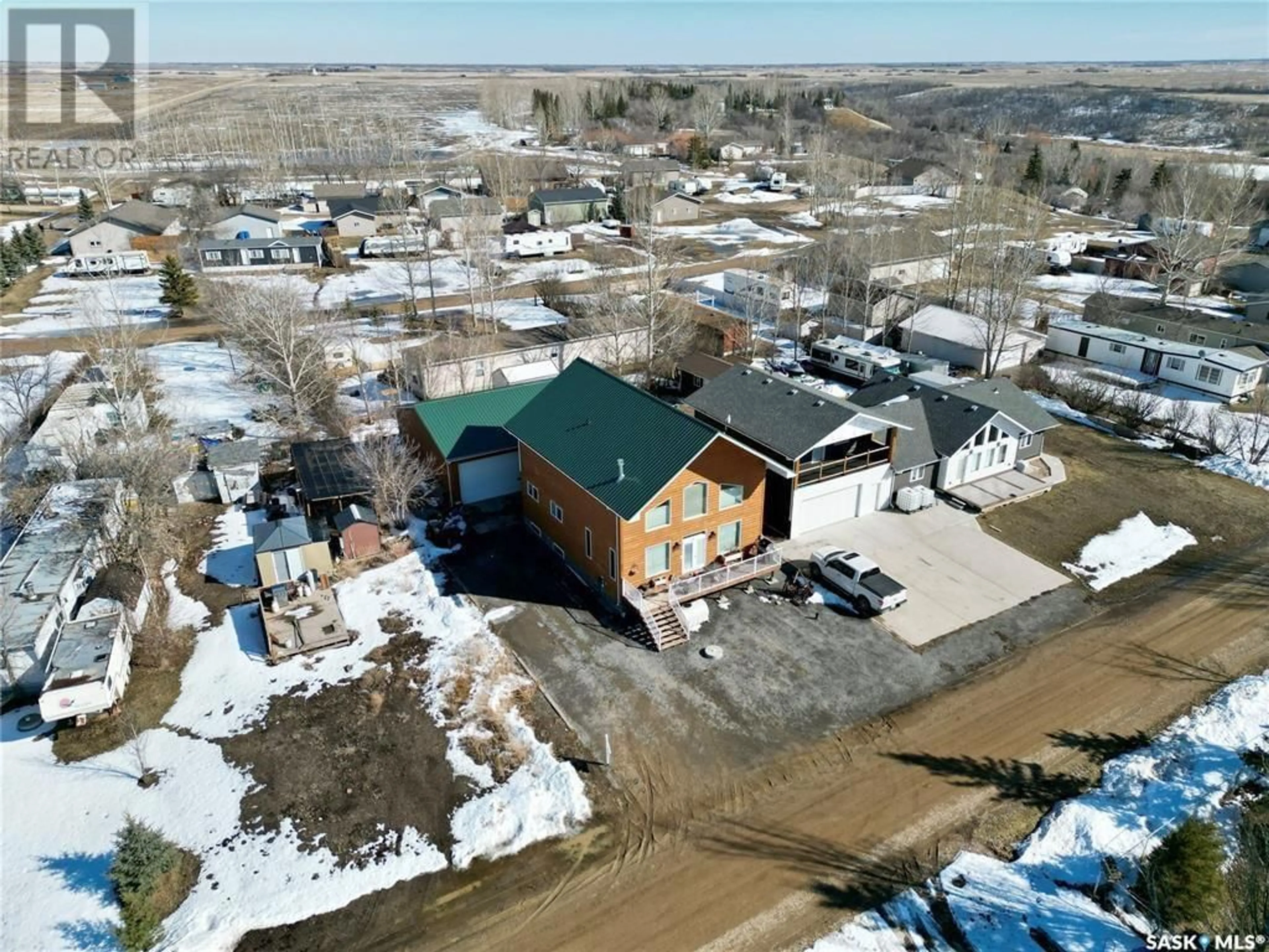 A pic from outside/outdoor area/front of a property/back of a property/a pic from drone, unknown for 77 KINGBIRD DRIVE, Glen Harbour Saskatchewan S0G4L0