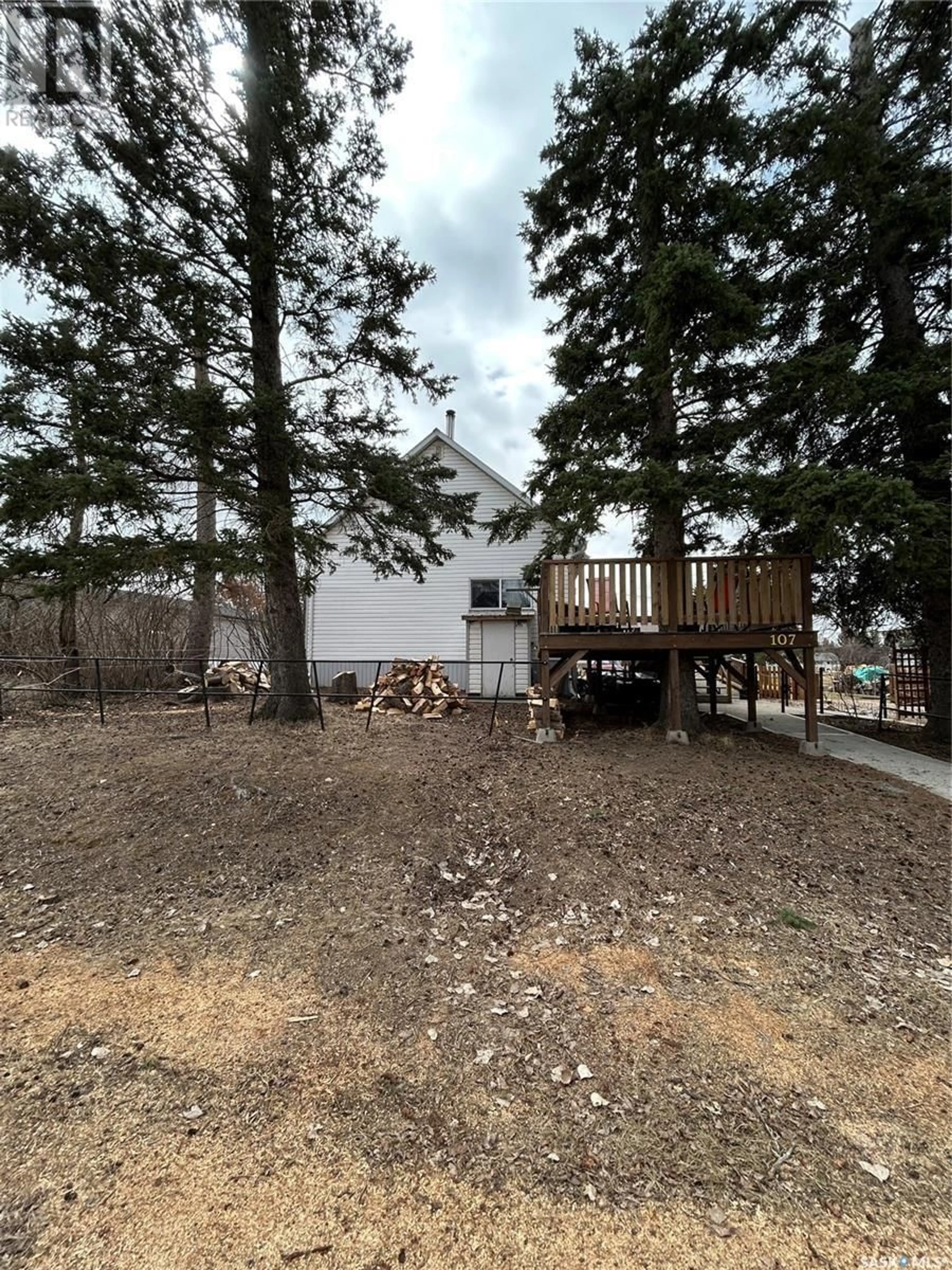 A pic from outside/outdoor area/front of a property/back of a property/a pic from drone, forest/trees view for 107 2ND AVENUE AVE, Lintlaw Saskatchewan S0A2H0