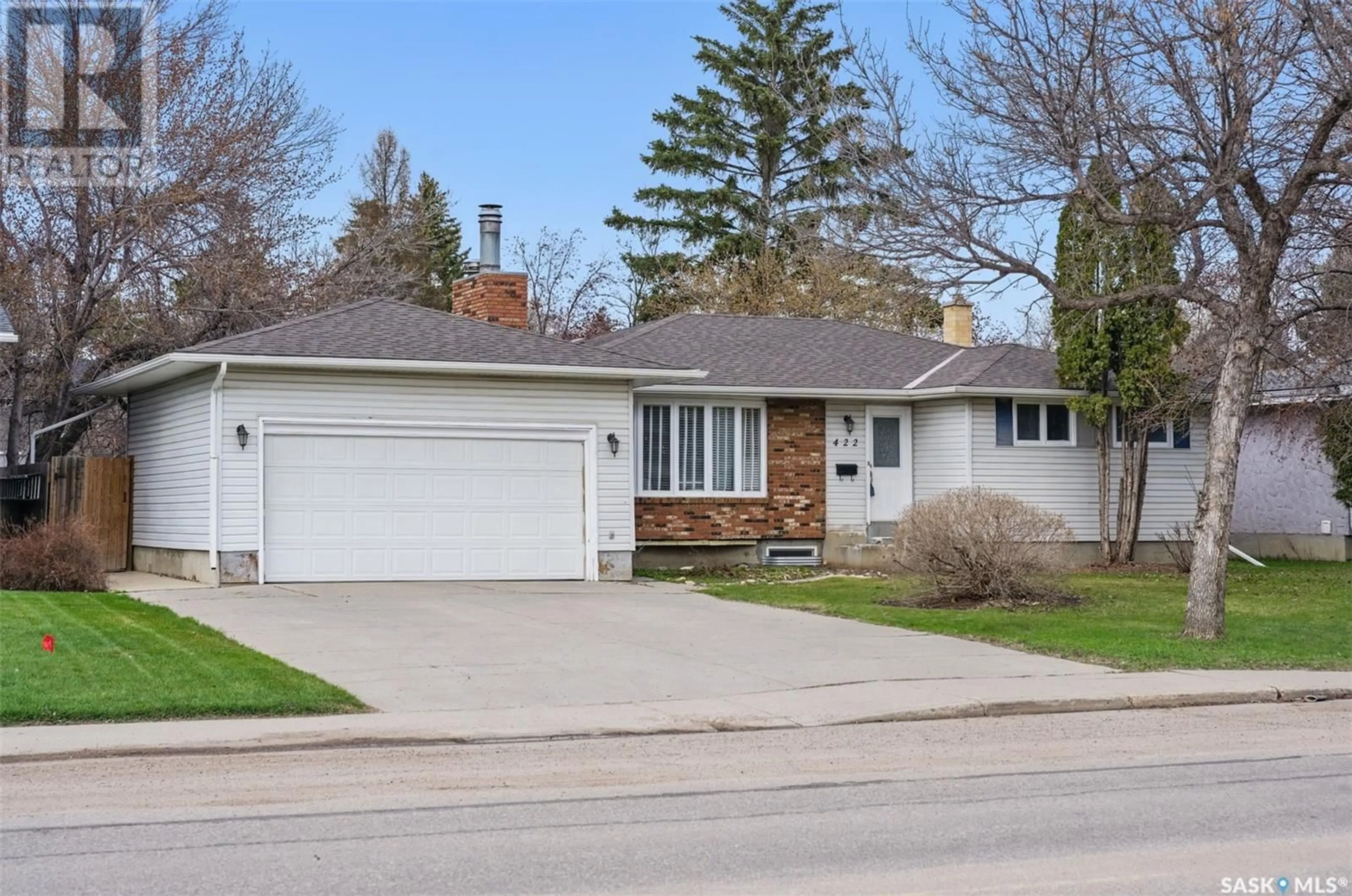 Home with vinyl exterior material, street for 422 115TH STREET, Saskatoon Saskatchewan S7N2E6