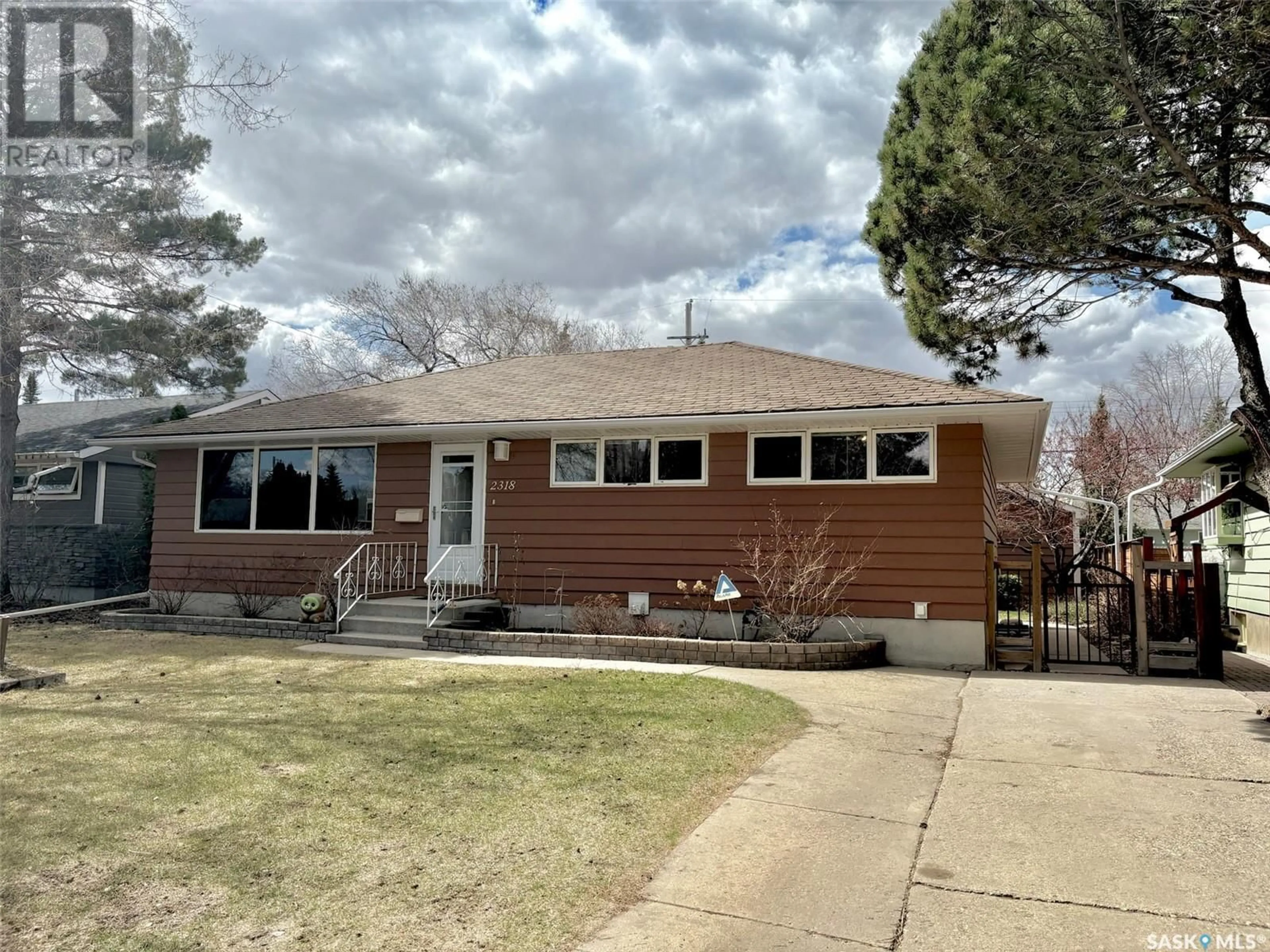 Home with vinyl exterior material, street for 2318 CAIRNS AVENUE, Saskatoon Saskatchewan S7J1V1