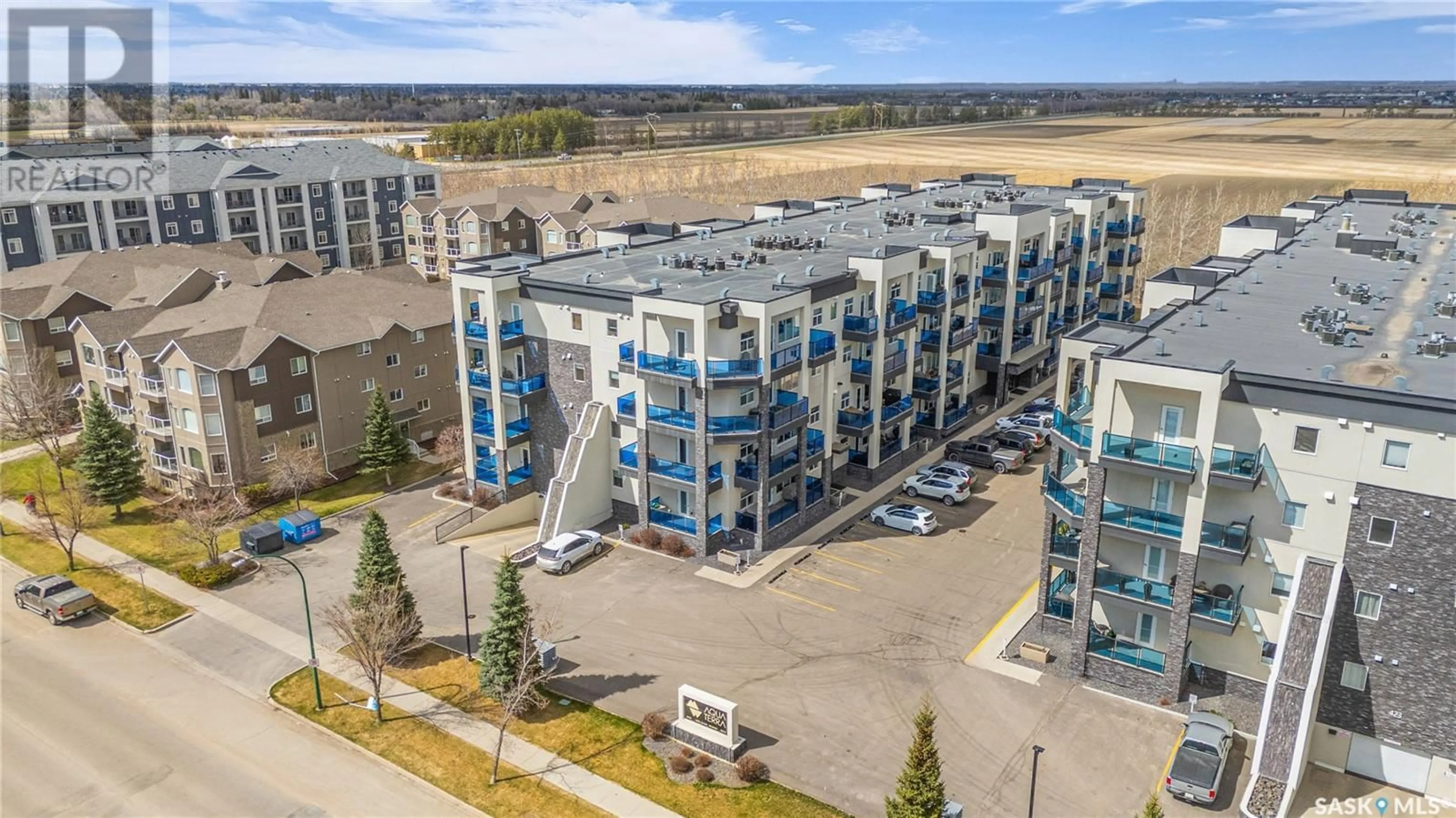 A pic from outside/outdoor area/front of a property/back of a property/a pic from drone, building for 419 - 111 NELSON ROAD, Saskatoon Saskatchewan S7S1P2