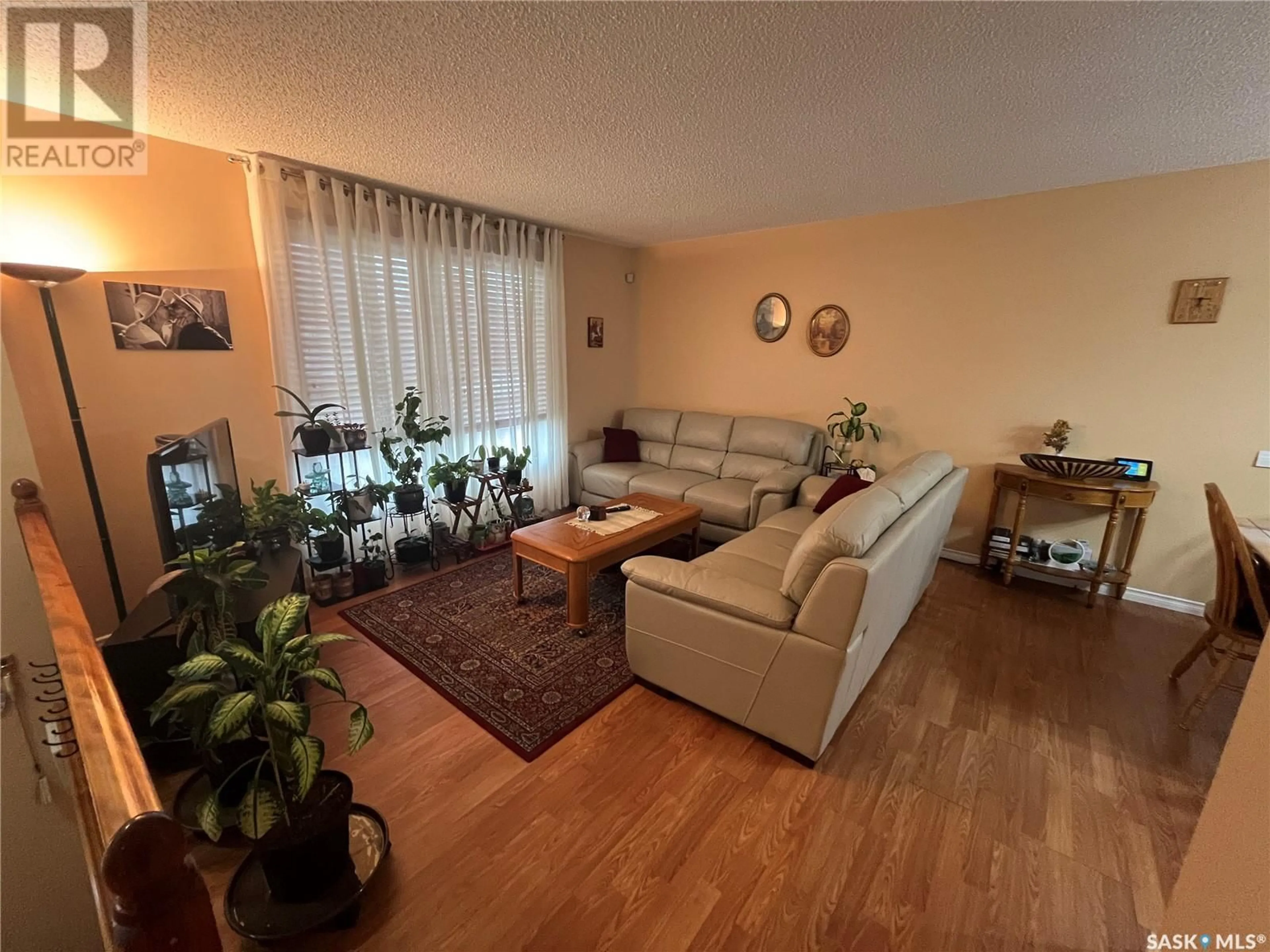Living room with furniture, unknown for 62 GALBRAITH CRESCENT, Saskatoon Saskatchewan S7M4H1