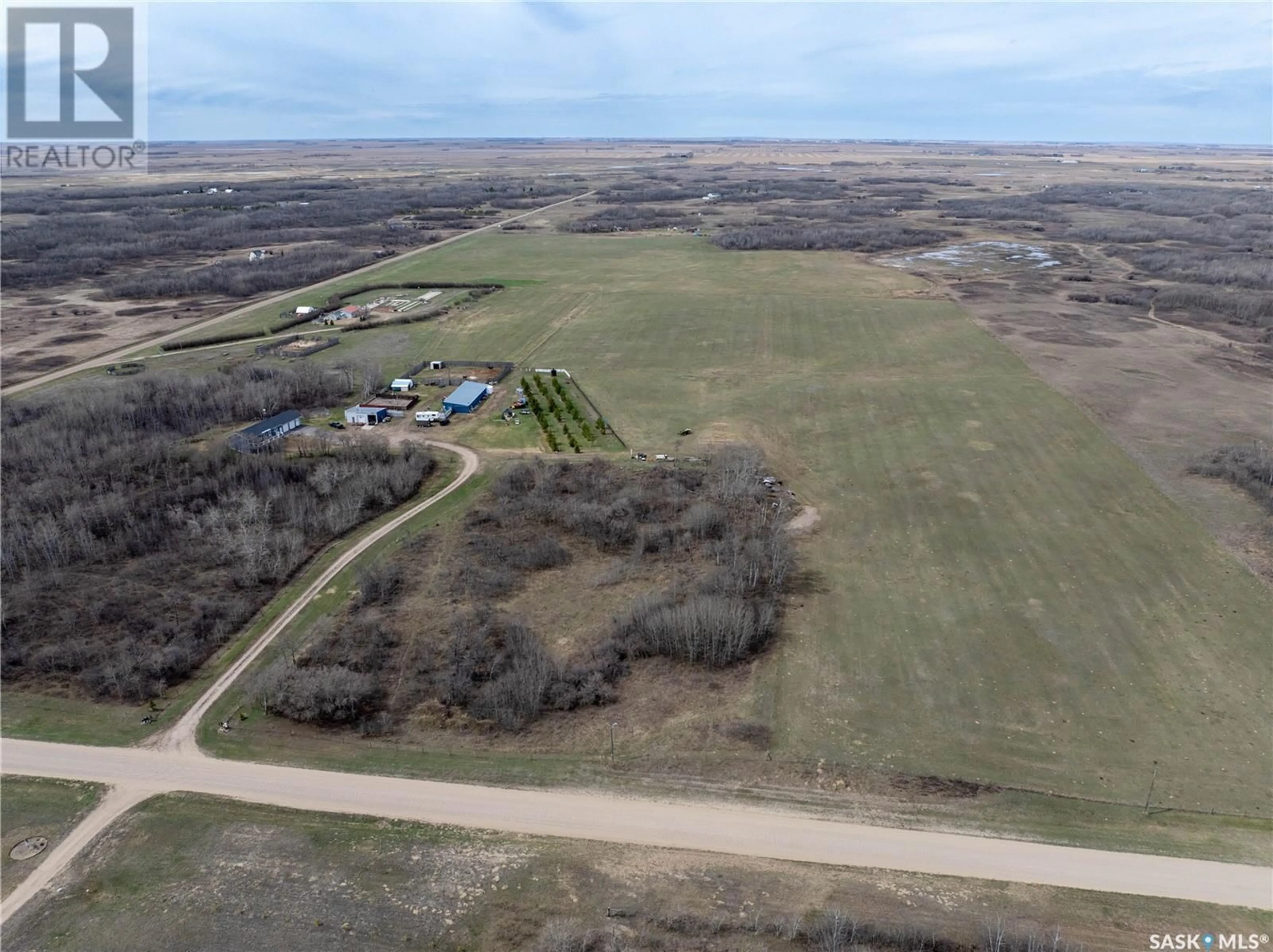 A pic from outside/outdoor area/front of a property/back of a property/a pic from drone, building for PHOENIX ACREAGE, Vanscoy Rm No. 345 Saskatchewan S0L0P0