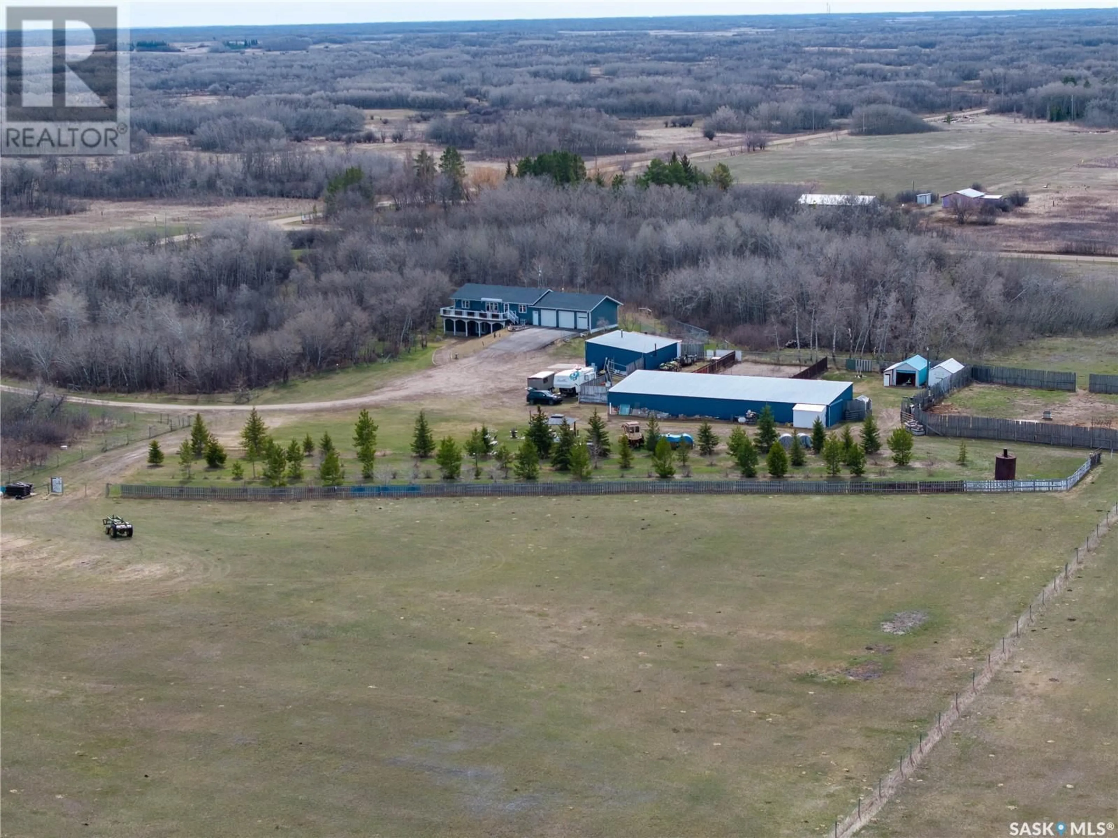 A pic from outside/outdoor area/front of a property/back of a property/a pic from drone, mountain view for PHOENIX ACREAGE, Vanscoy Rm No. 345 Saskatchewan S0L0P0