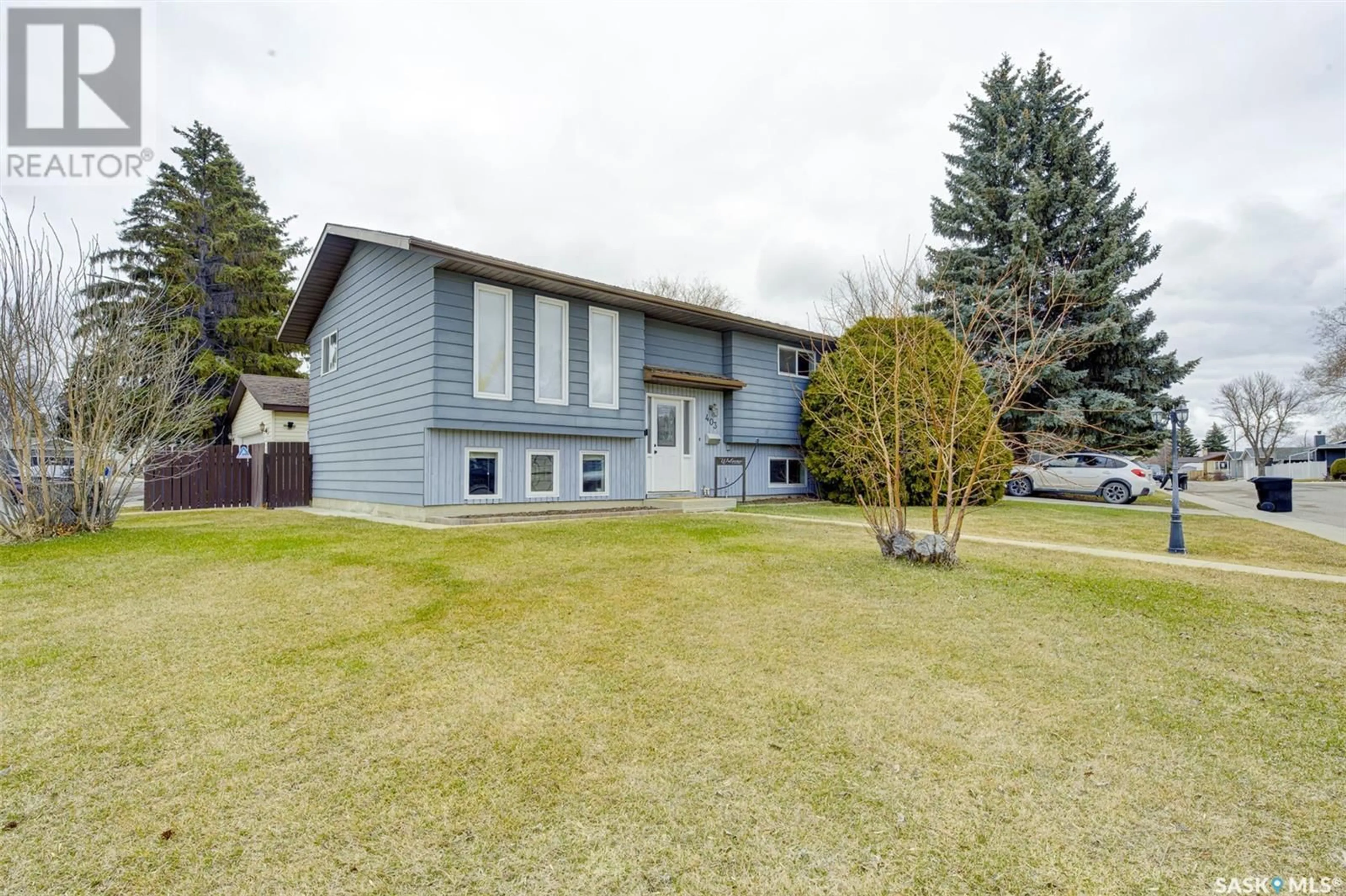 Home with vinyl exterior material, street for 403 CHARLEBOIS WAY, Saskatoon Saskatchewan S7K5J8