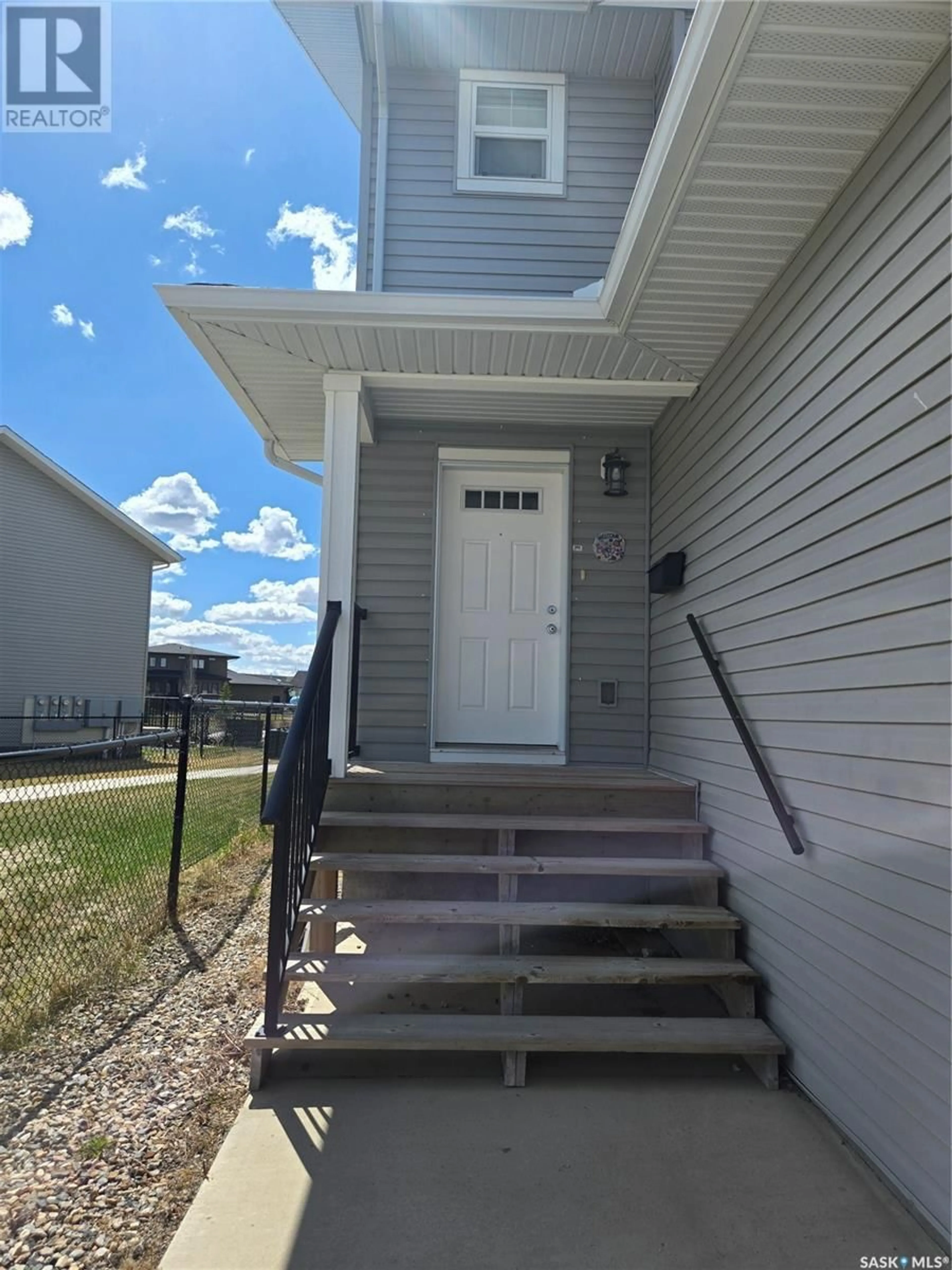 Home with vinyl exterior material, street for 2401 MORSKY DRIVE, Estevan Saskatchewan S4A2Y4
