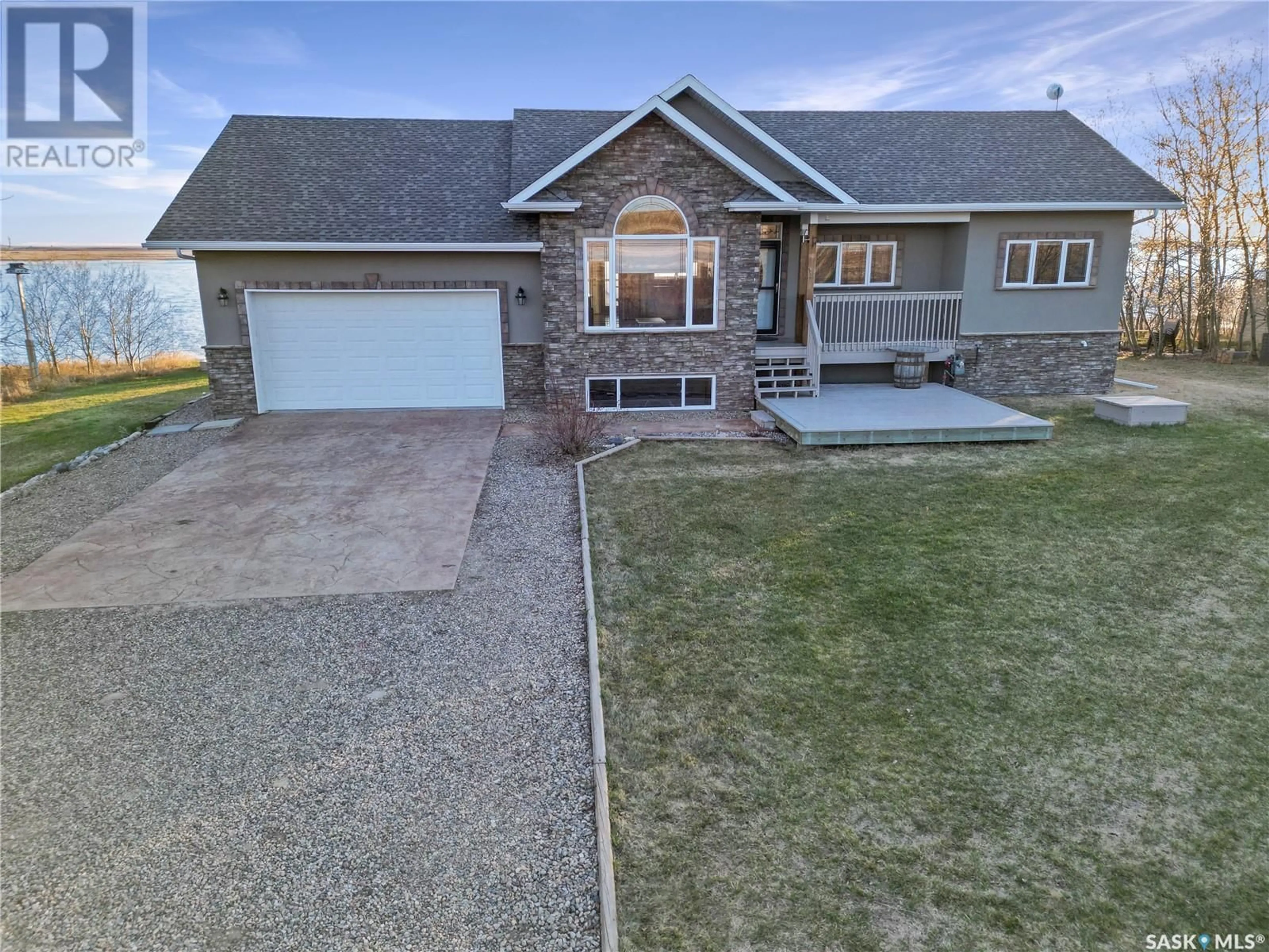 A pic from outside/outdoor area/front of a property/back of a property/a pic from drone, unknown for 1 SUMMERFIELD DRIVE, Jackfish Lake Saskatchewan S0M0L0