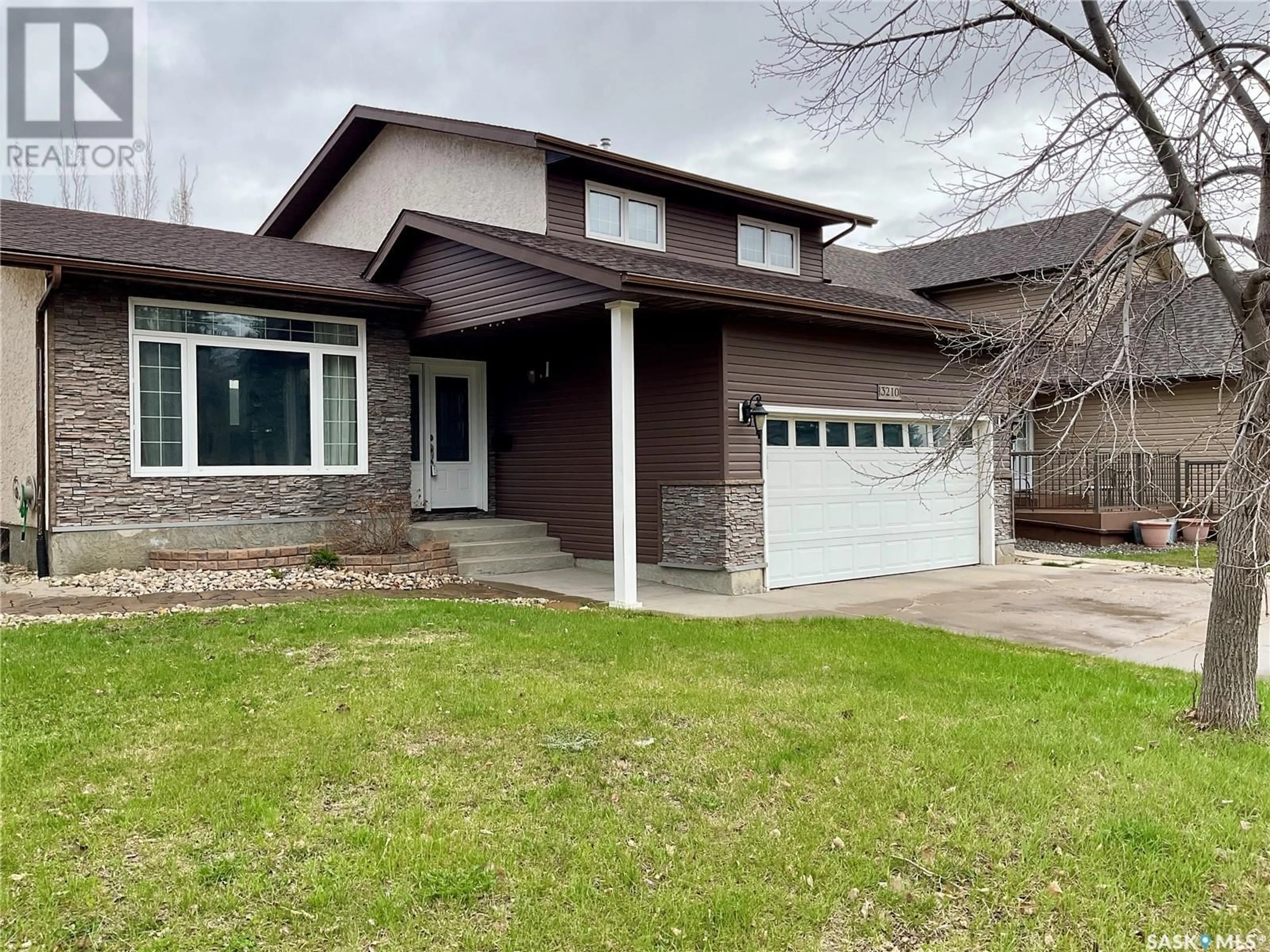 Home with brick exterior material, street for 3210 ARENS ROAD, Regina Saskatchewan S4V1J8
