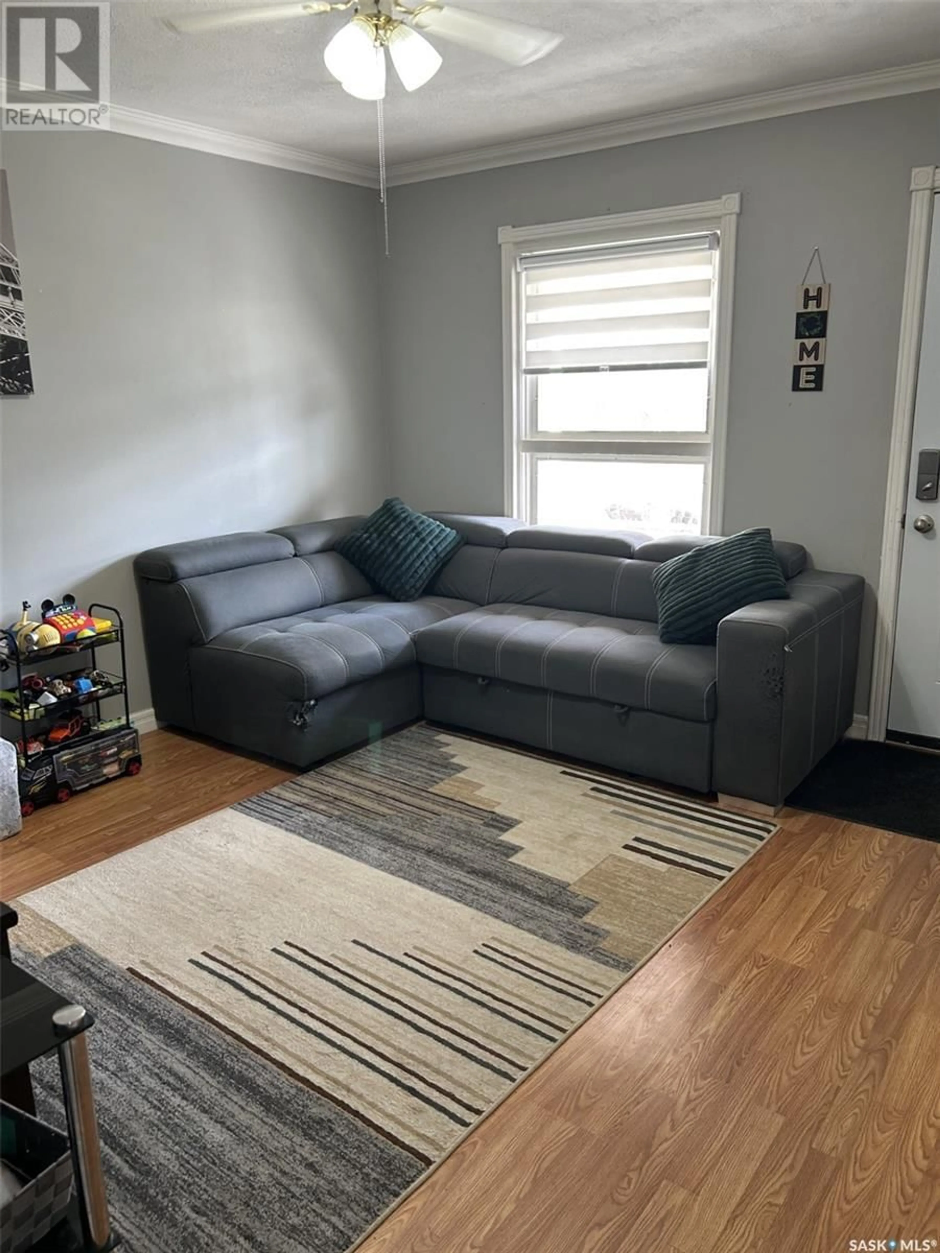 Living room with furniture, unknown for 718 ATHABASCA STREET E, Moose Jaw Saskatchewan S6H0M5