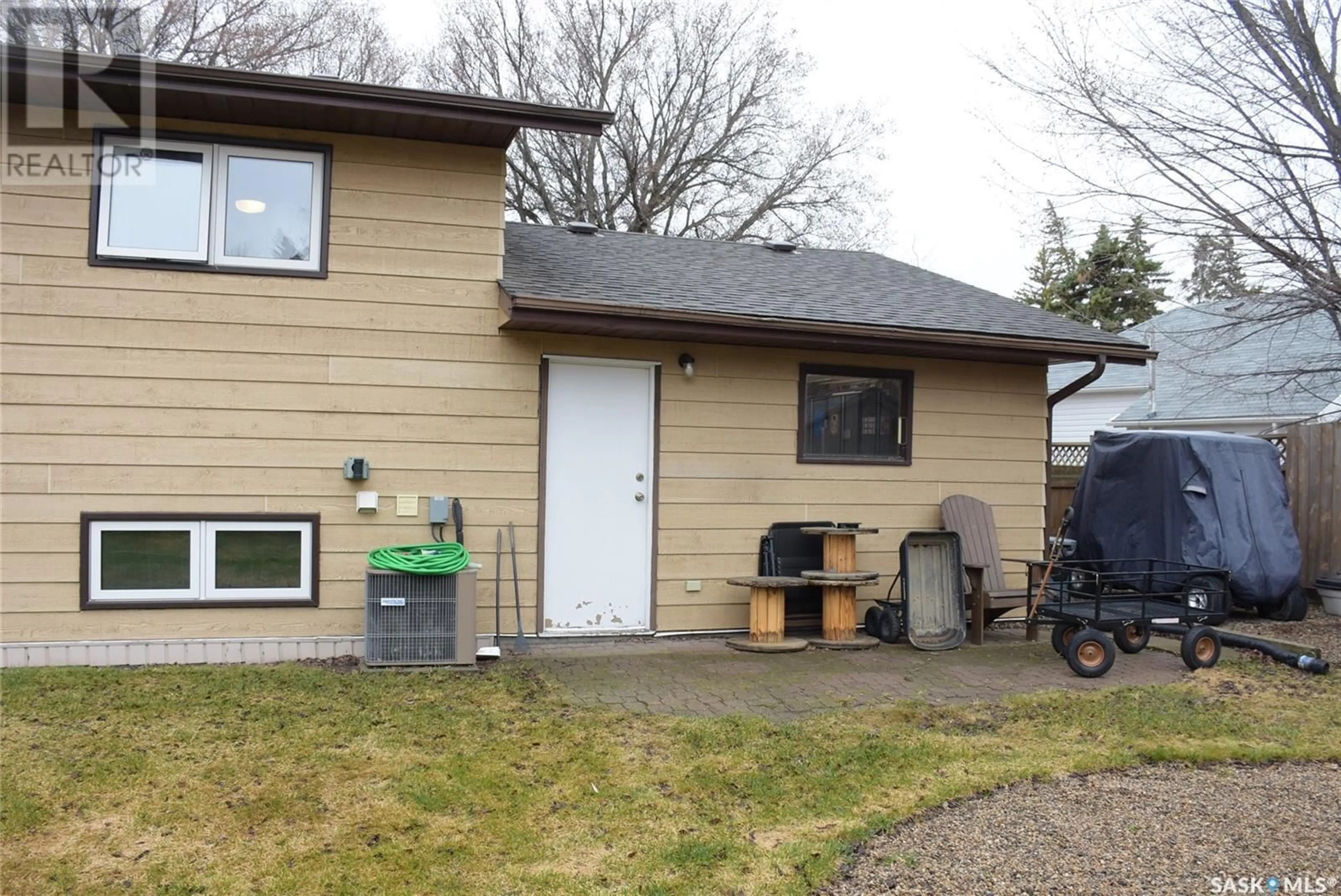 Home with vinyl exterior material, street for 119 DEWDNEY STREET, Indian Head Saskatchewan S0G2K0