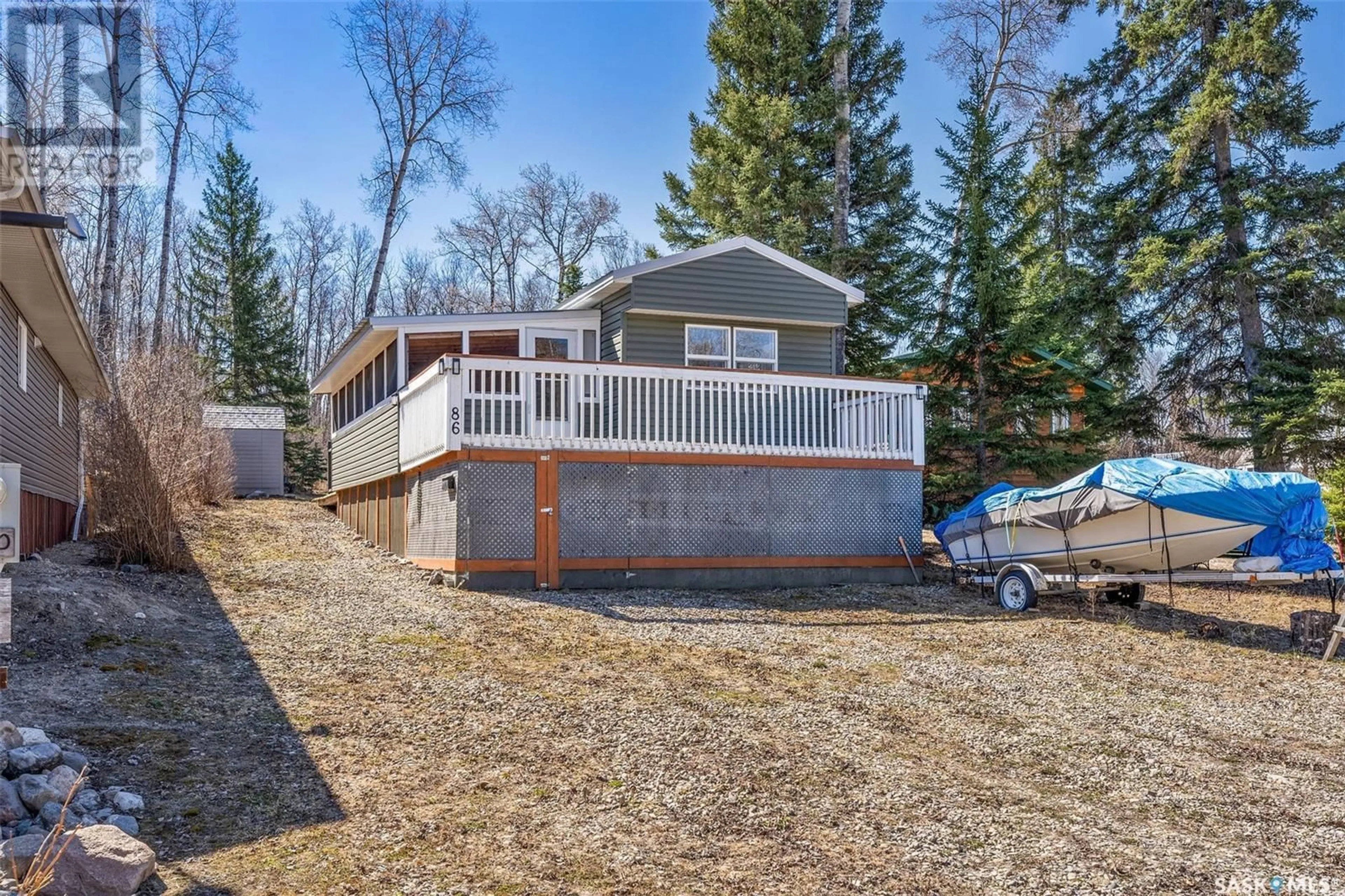 A pic from outside/outdoor area/front of a property/back of a property/a pic from drone, water/lake/river/ocean view for 86 ROTHENBURG PARK, Emma Lake Saskatchewan S0J0N0