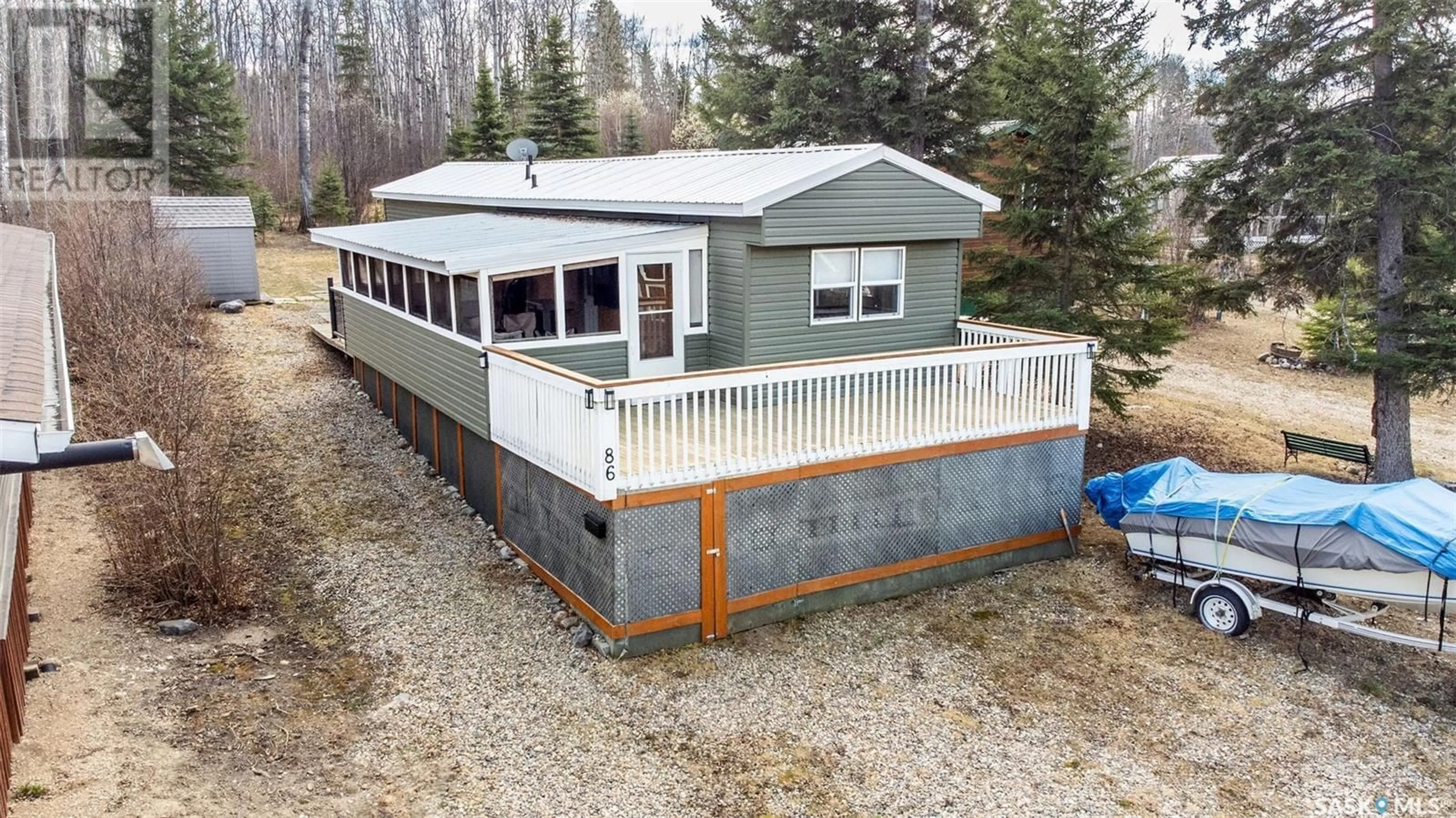 A pic from outside/outdoor area/front of a property/back of a property/a pic from drone, building for 86 ROTHENBURG PARK, Emma Lake Saskatchewan S0J0N0