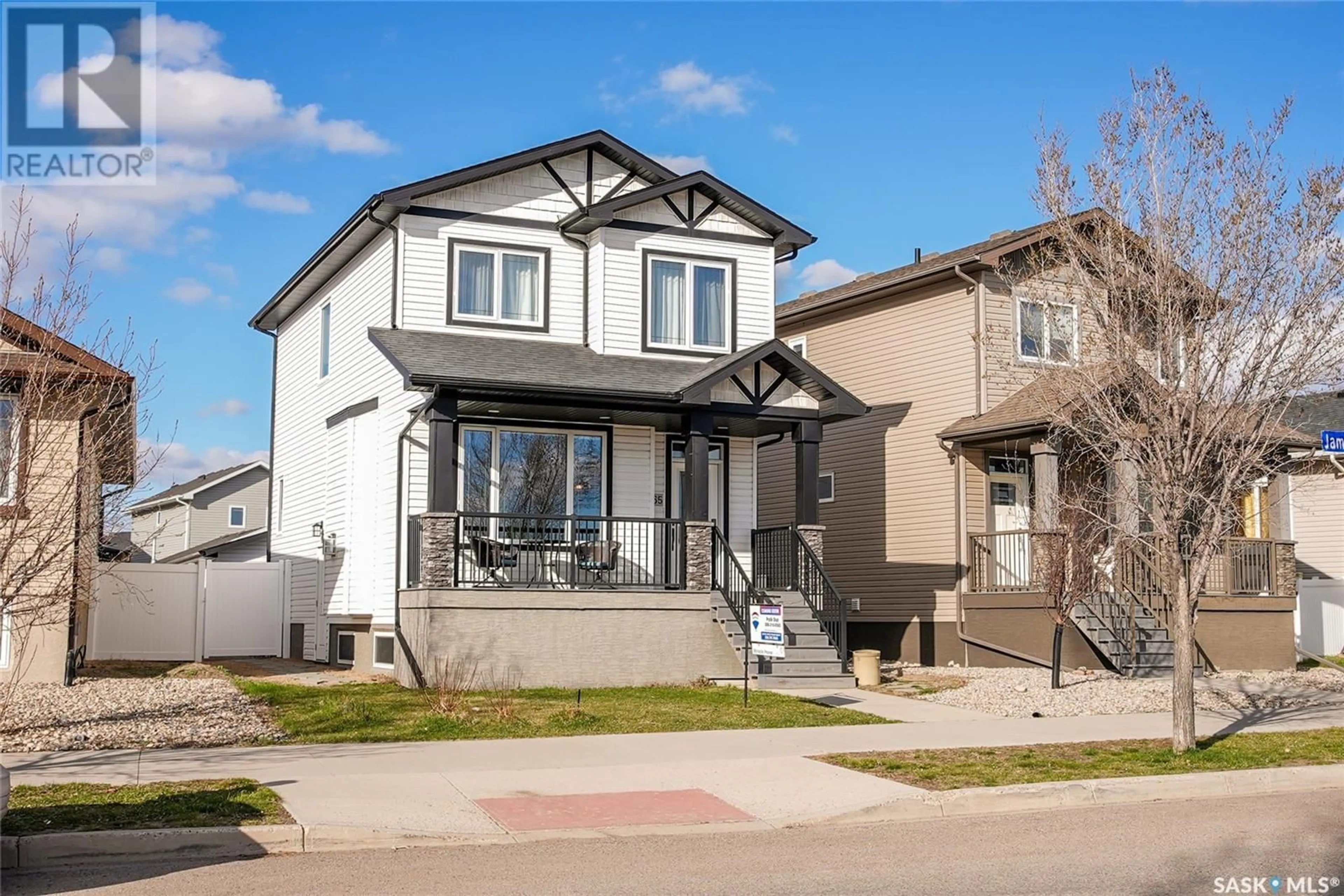 Home with vinyl exterior material, street for 4665 JAMES HILL ROAD, Regina Saskatchewan S4W0C7