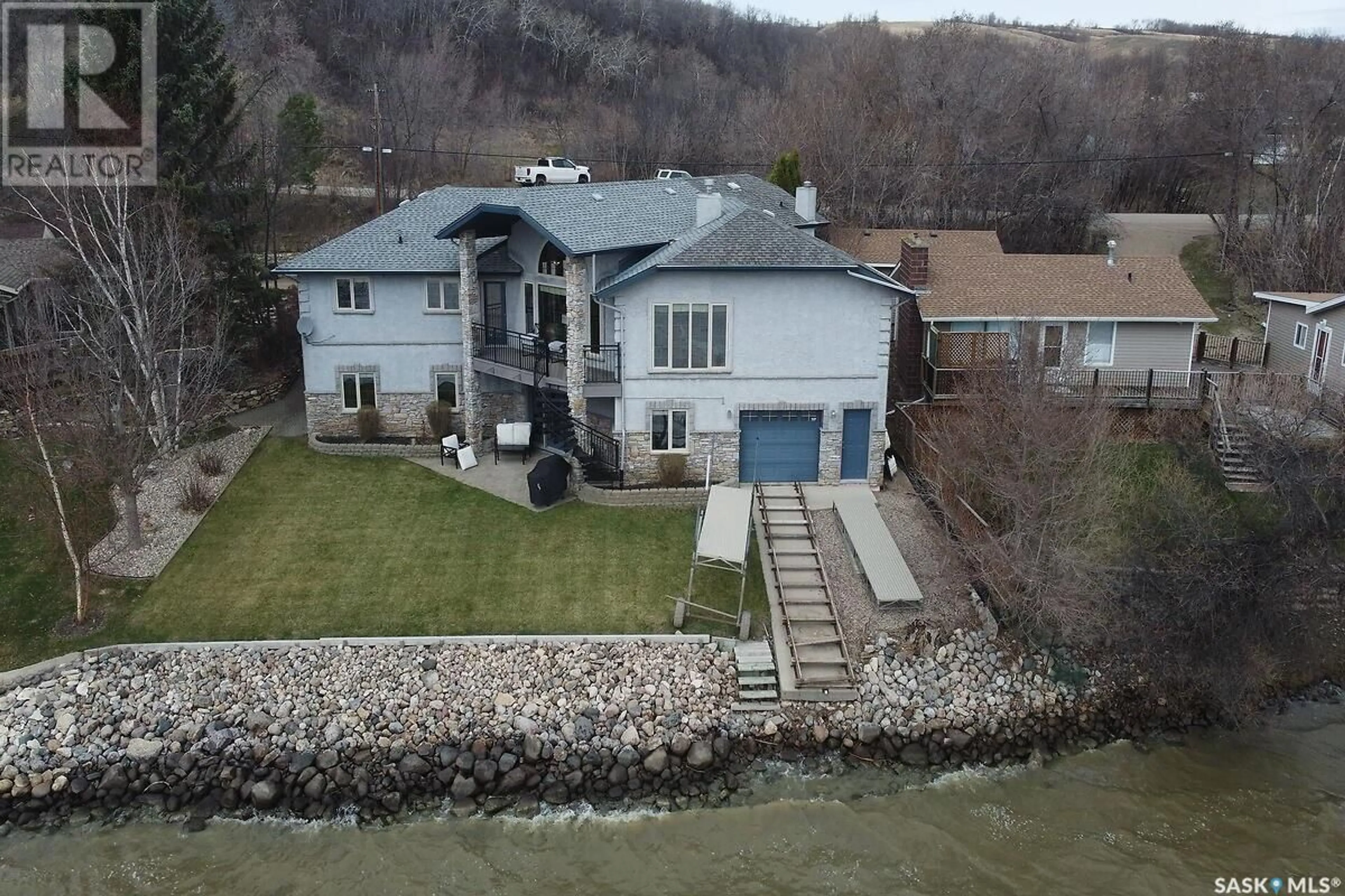 A pic from outside/outdoor area/front of a property/back of a property/a pic from drone, water/lake/river/ocean view for 604 PASQUA LAKE ROAD, Pasqua Lake Saskatchewan S0G1S0