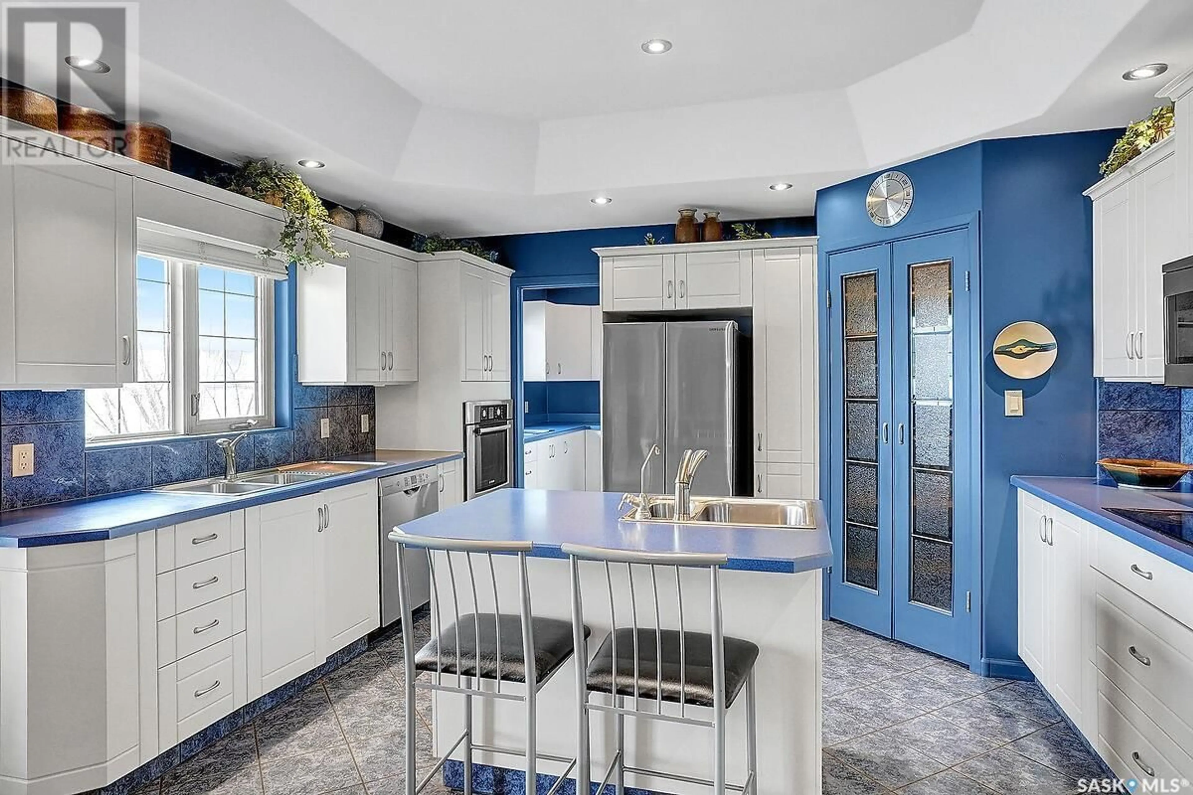 Contemporary kitchen, ceramic/tile floor for 604 PASQUA LAKE ROAD, Pasqua Lake Saskatchewan S0G1S0