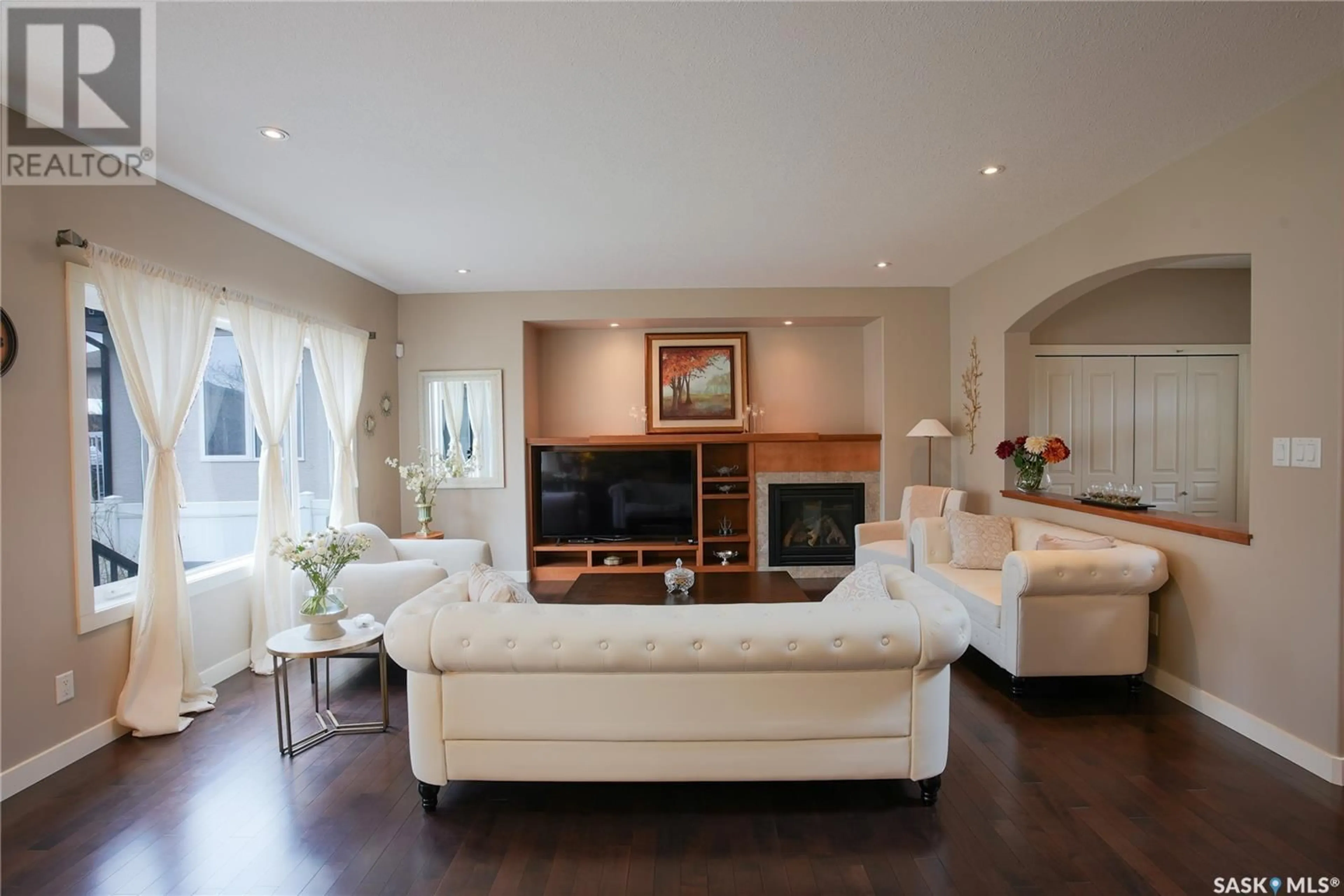 Living room with furniture, wood/laminate floor for 4629 MALCOLM DRIVE, Regina Saskatchewan S4W0B5