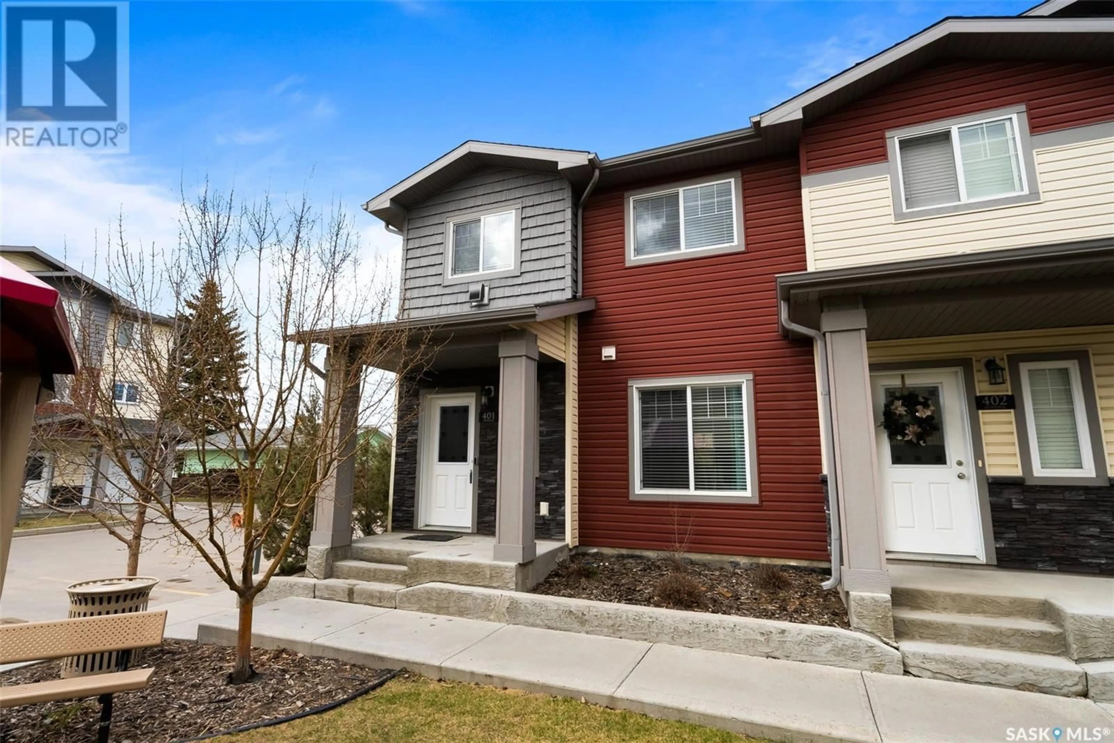 Home with brick exterior material, street for 401 - 3440 AVONHURST DRIVE, Regina Saskatchewan S4R2E1