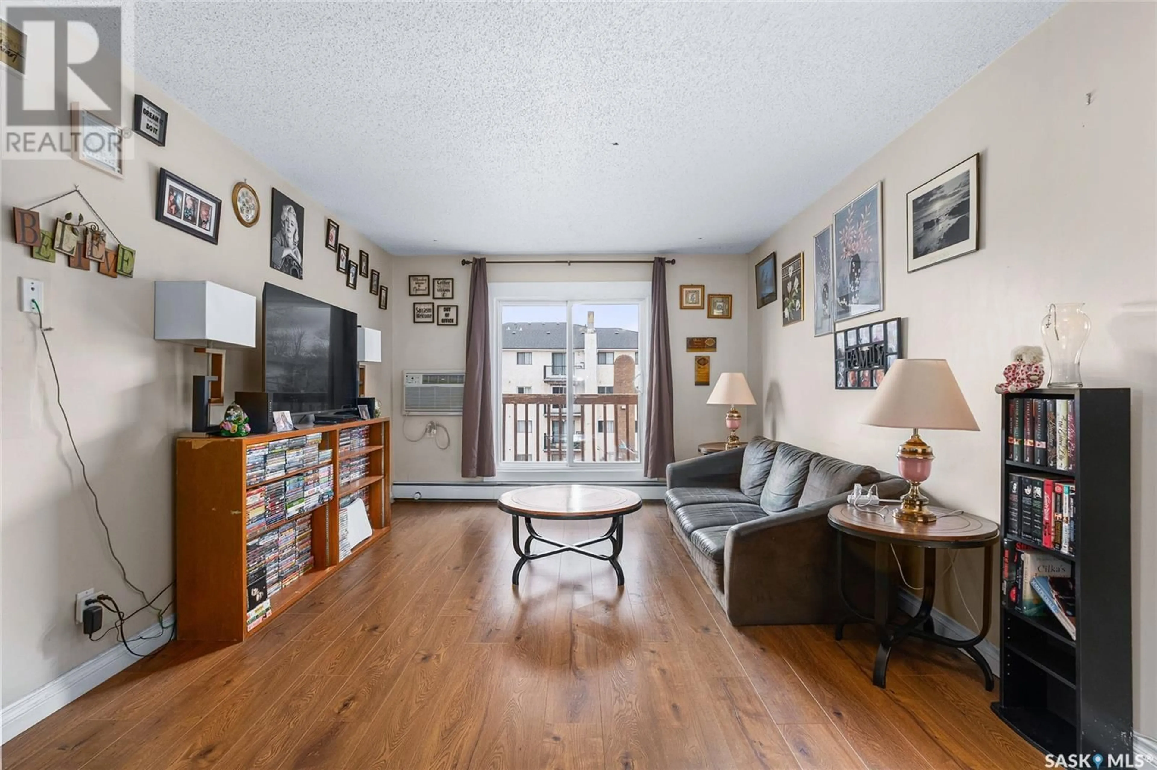 Living room with furniture, unknown for 304 - 522 X AVENUE, Saskatoon Saskatchewan S7M4X9