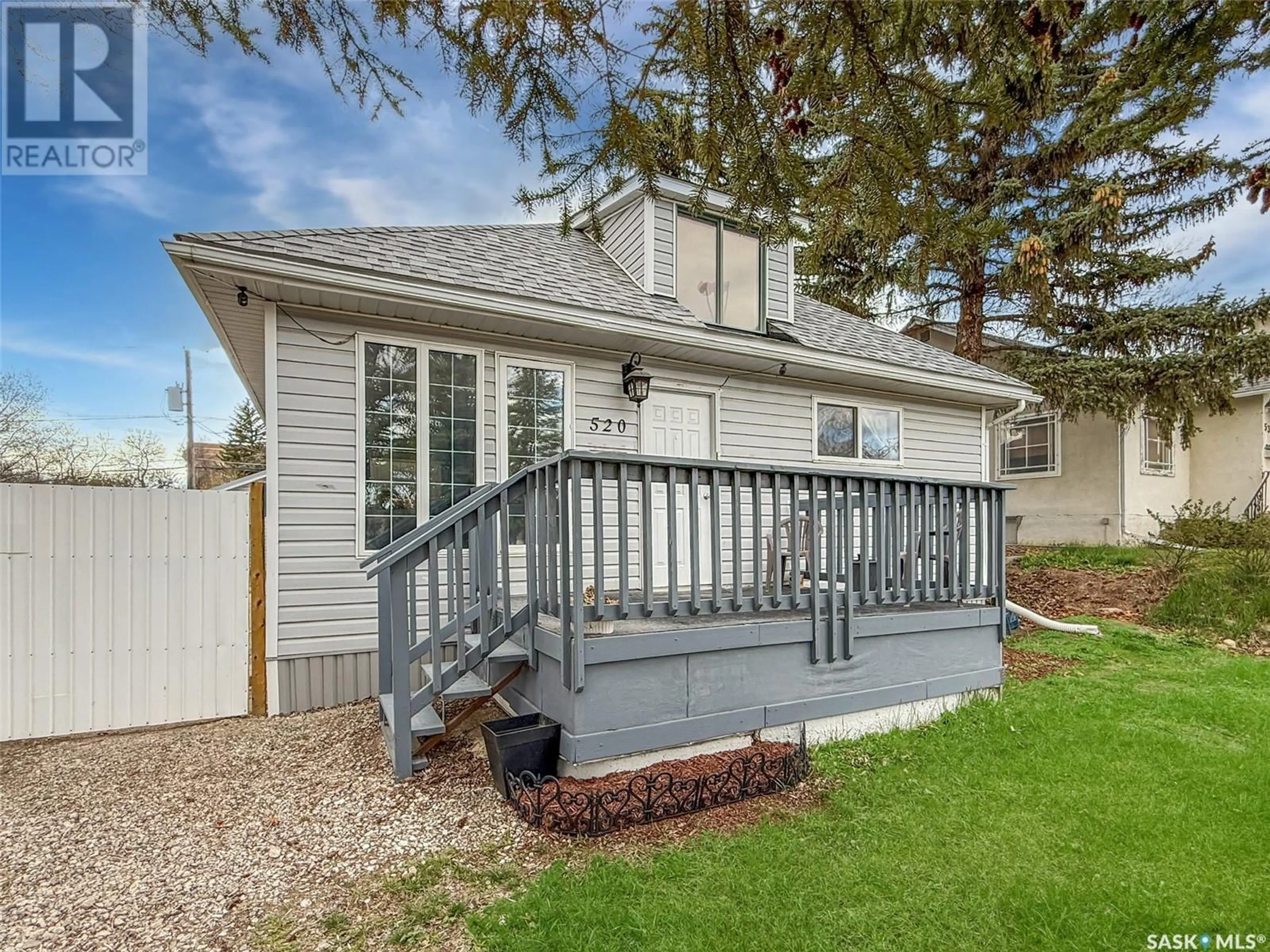 Home with vinyl exterior material, street for 520 CENTRAL AVENUE, Swift Current Saskatchewan S9H0L9