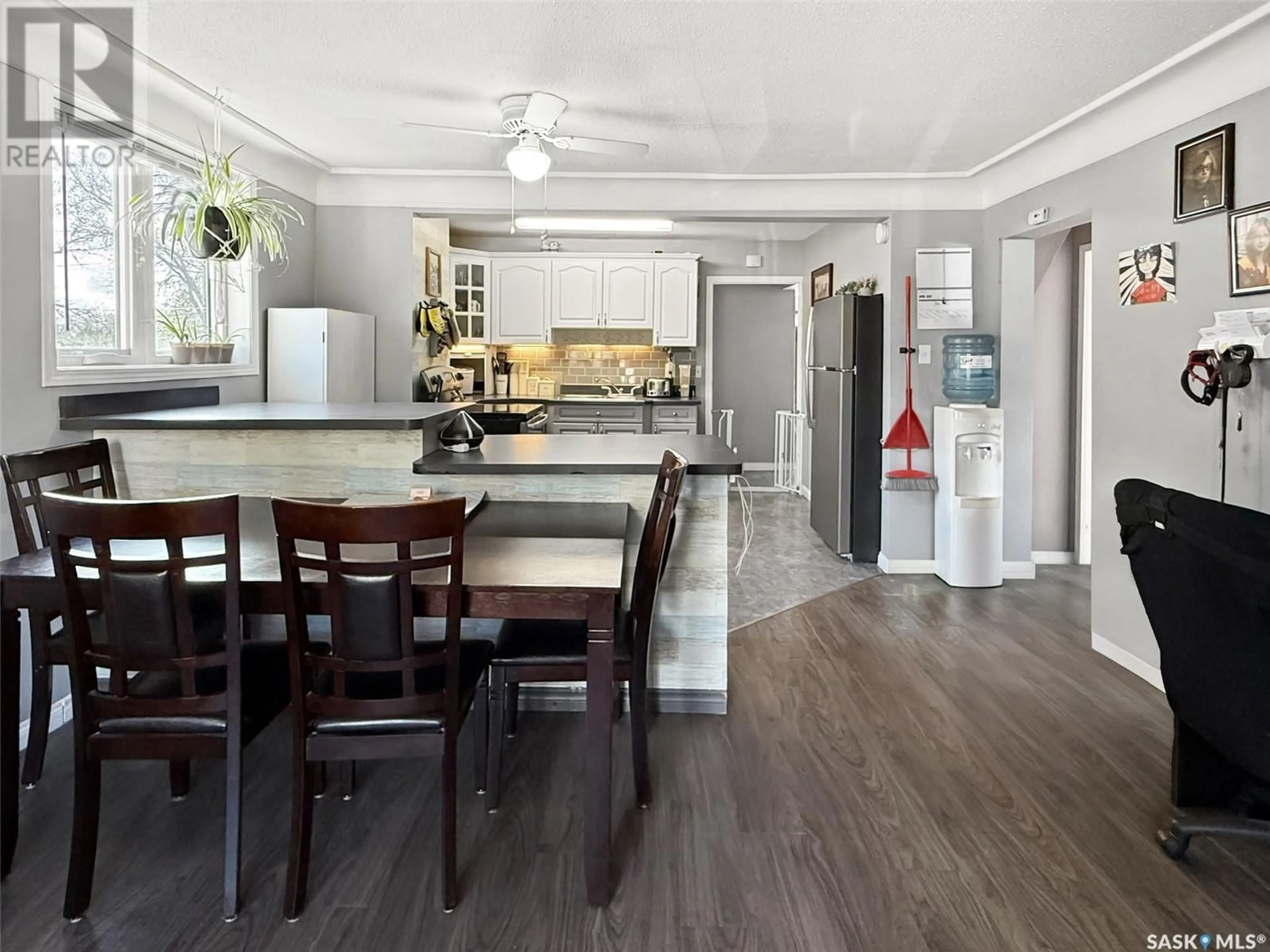Open concept kitchen, wood/laminate floor for 520 CENTRAL AVENUE, Swift Current Saskatchewan S9H0L9