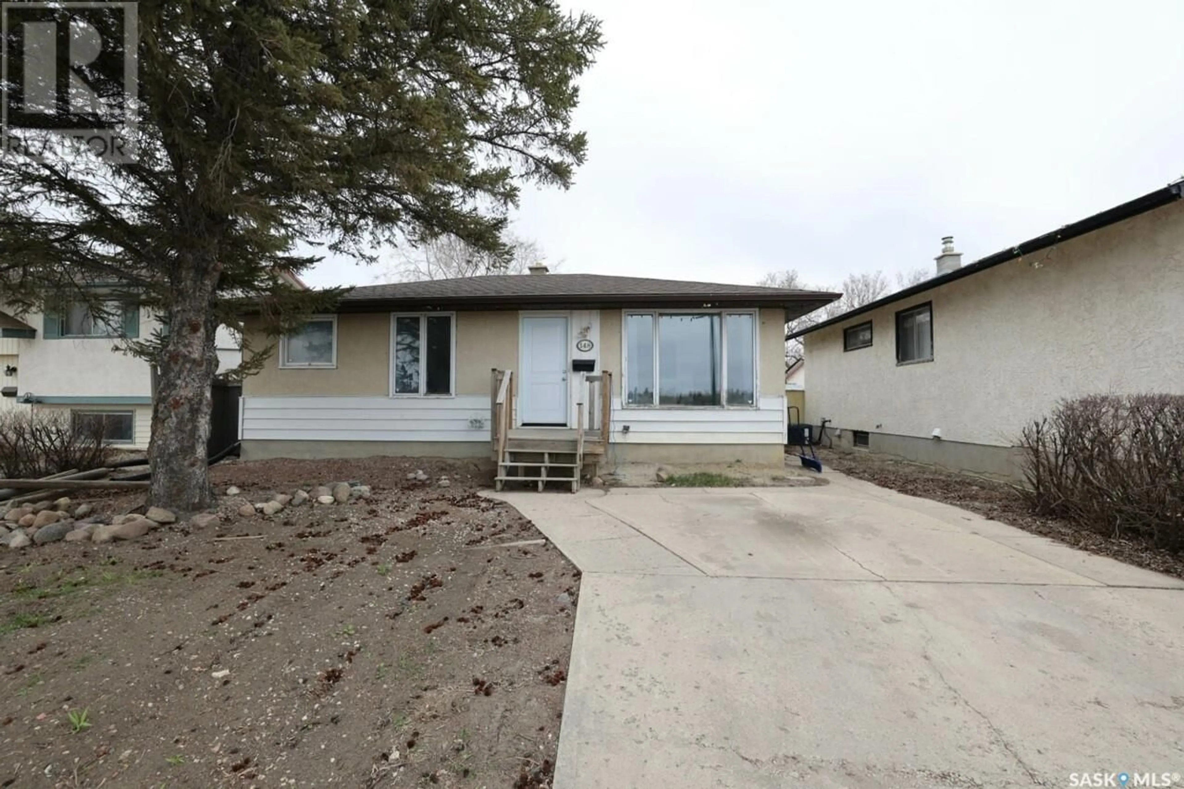 Home with vinyl exterior material, street for 148 RITTER AVENUE, Regina Saskatchewan S4T6E3