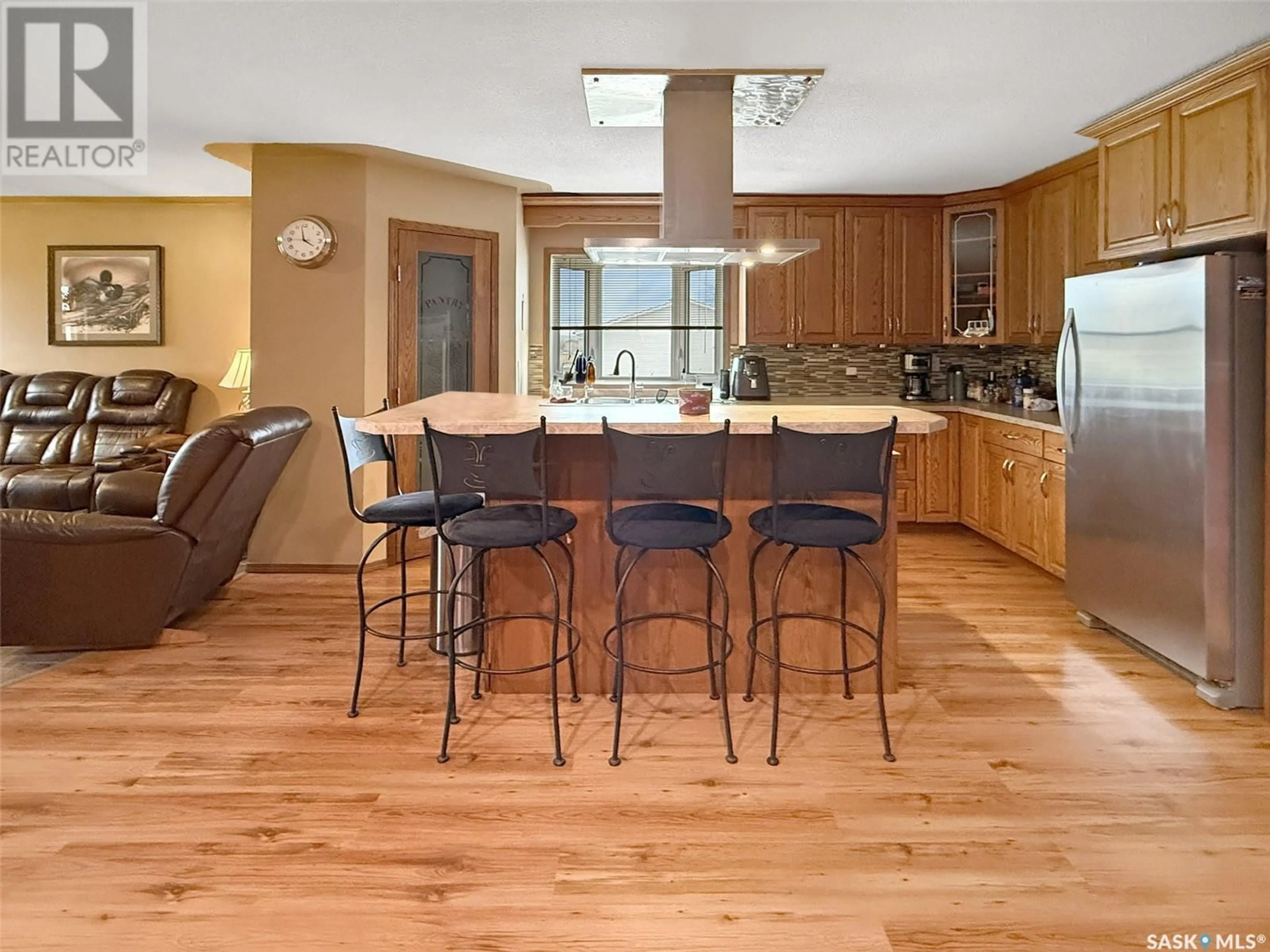 Open concept kitchen, wood/laminate floor for 216 PACIFIC AVENUE, Beverley Saskatchewan S9H4V1